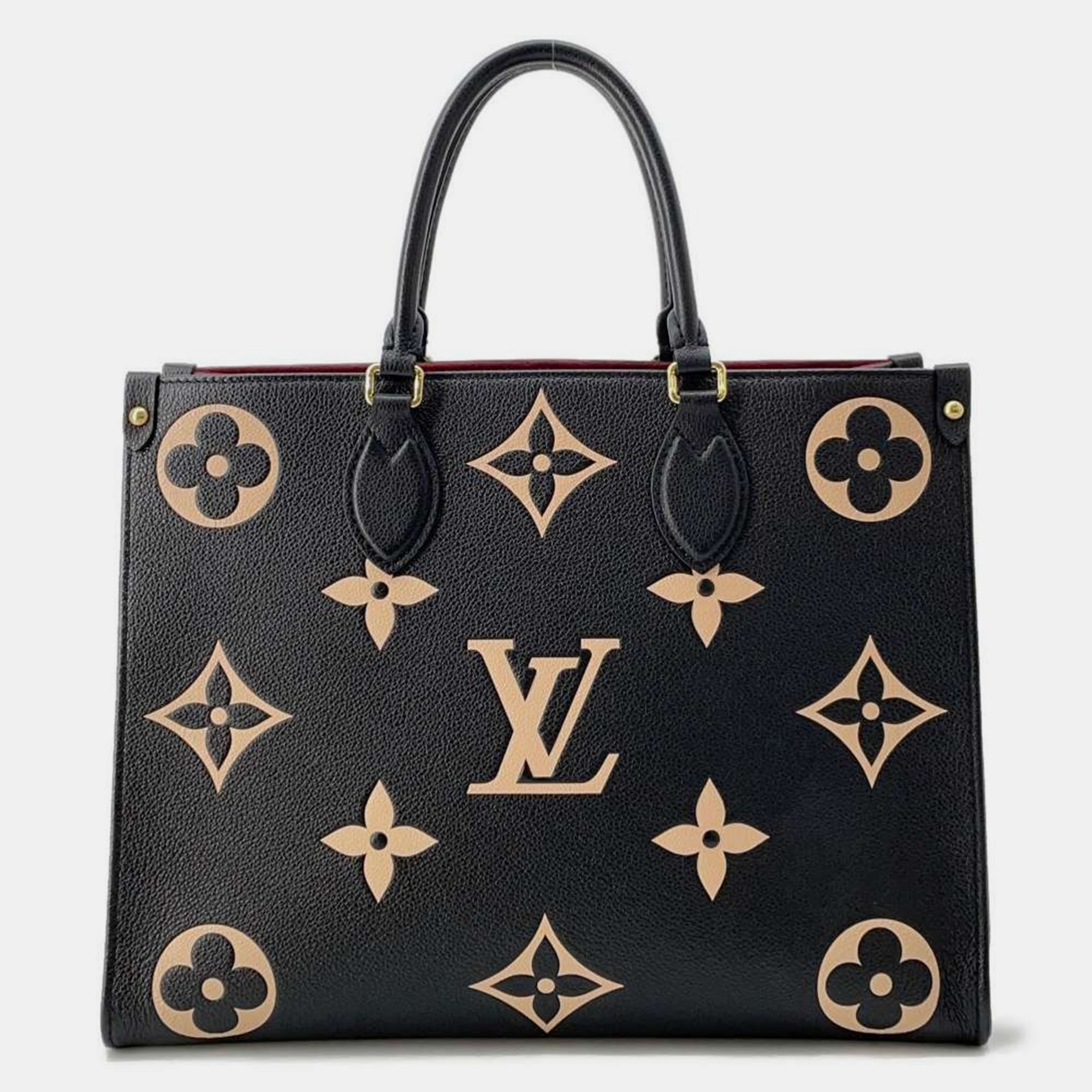 

Louis Vuitton Noir/Beige Bicolor Monogram Empreinte Leather Onthego MM