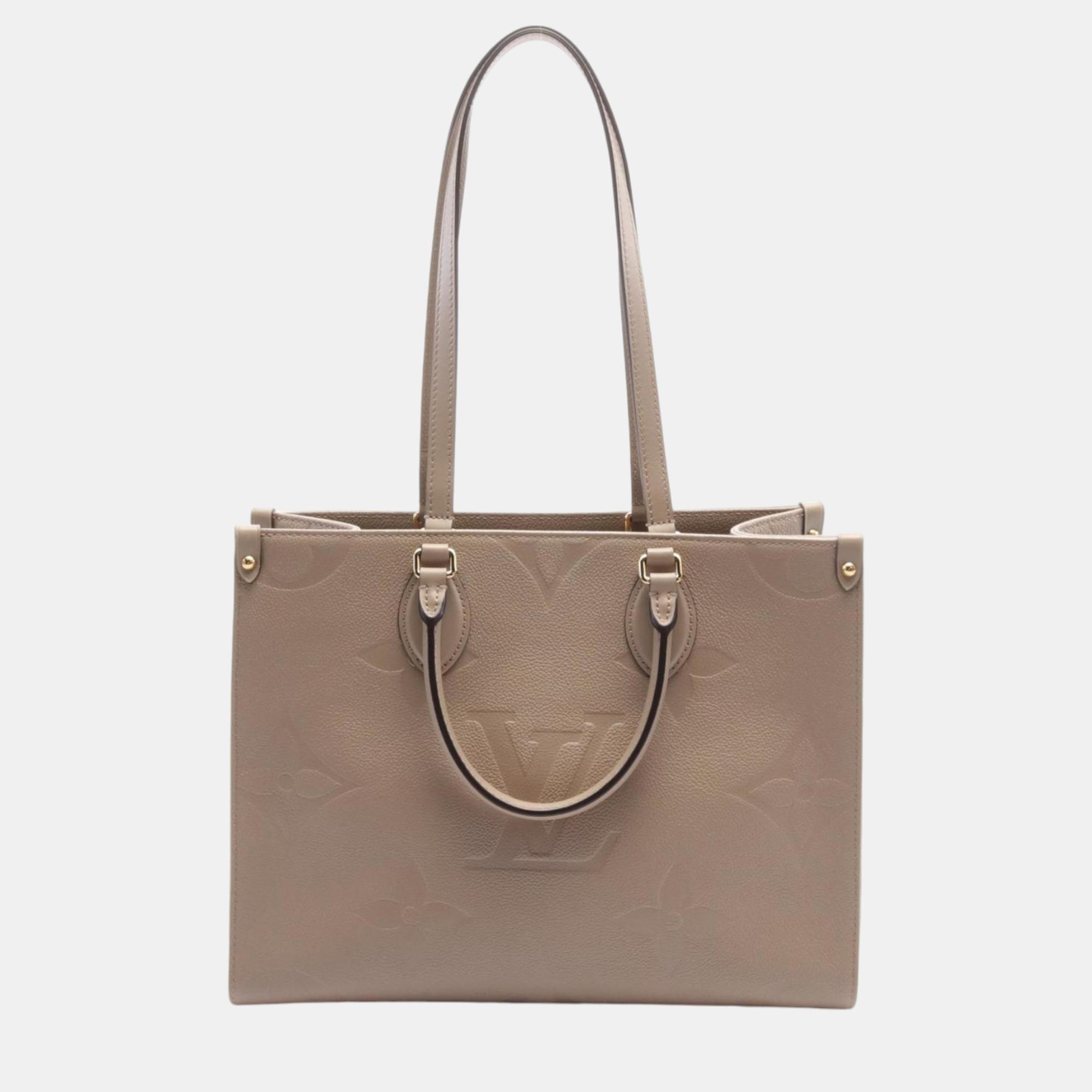 

Louis Vuitton On The Go Mm Monogram Leather Empreinte Beige Tote Bag