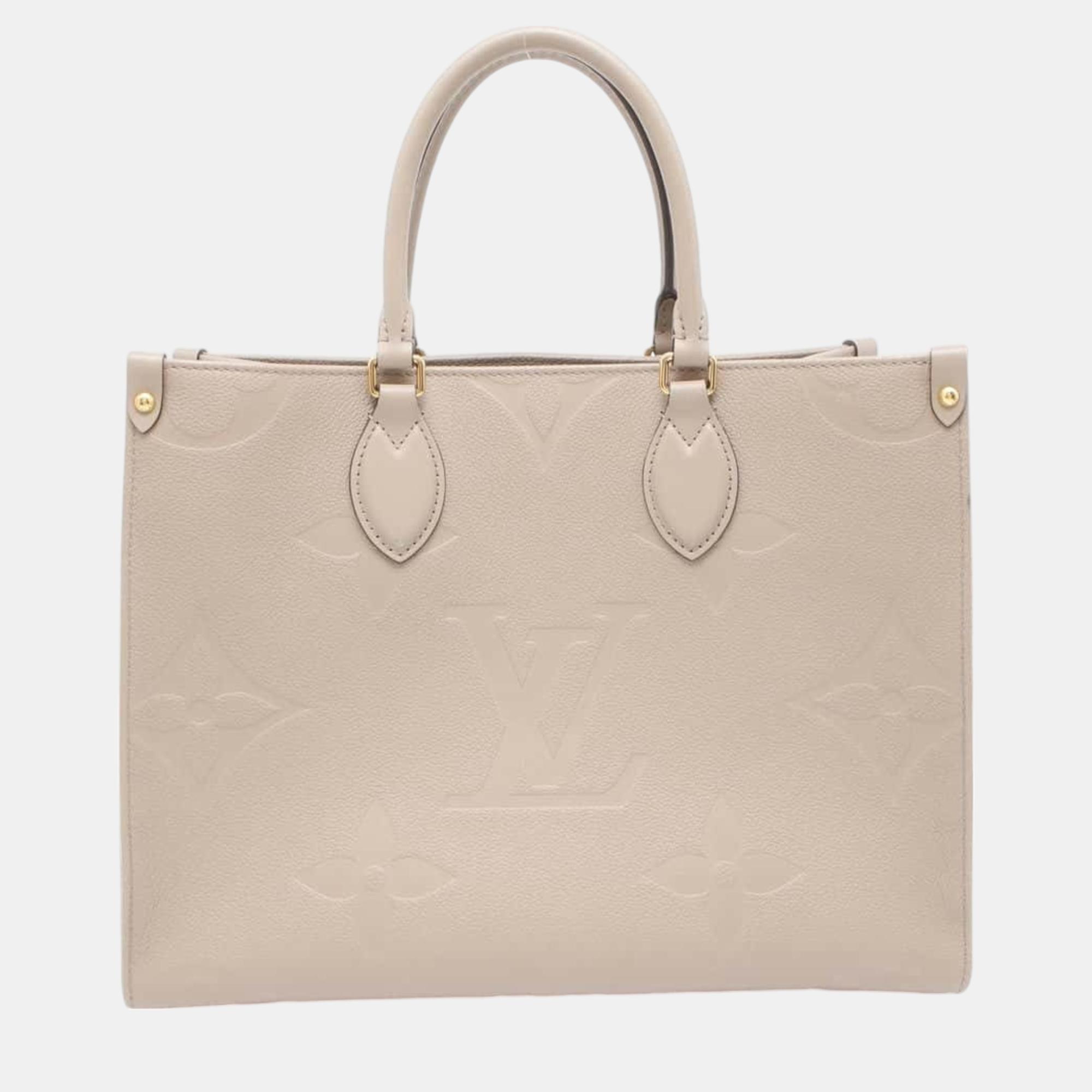 

Louis Vuitton Monogram Empreinte On The Go Mm Handbag, Beige