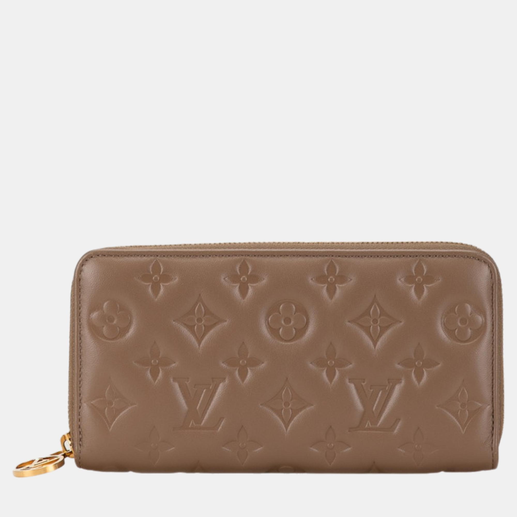 

Louis Vuitton Beige Leather Monogram Zippy Wallet