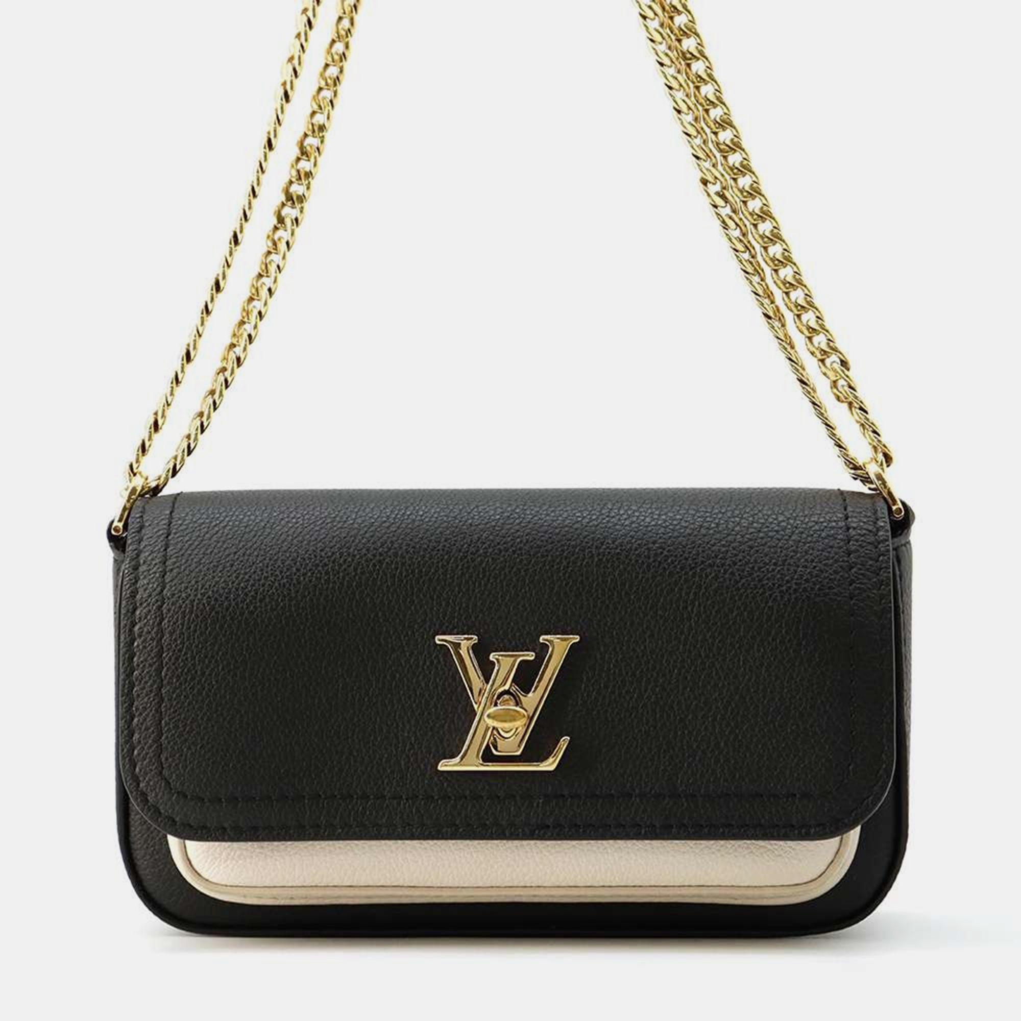 

Louis Vuitton Noir/Beige Leather Rock Me Tender bag, Black