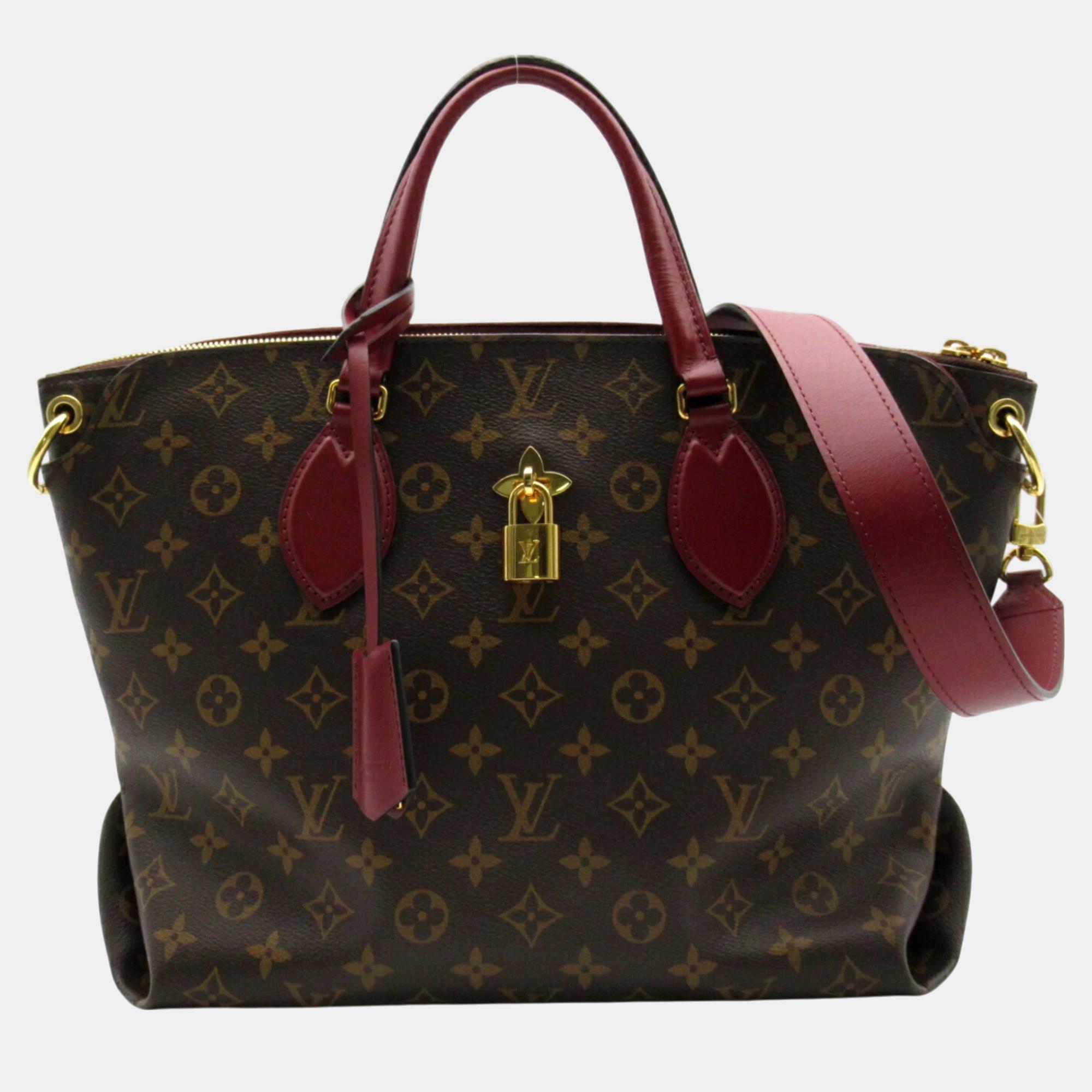 

Louis Vuitton Coated Canvas Monogram Brown Riduvan Flower Zip Tote MM Bag