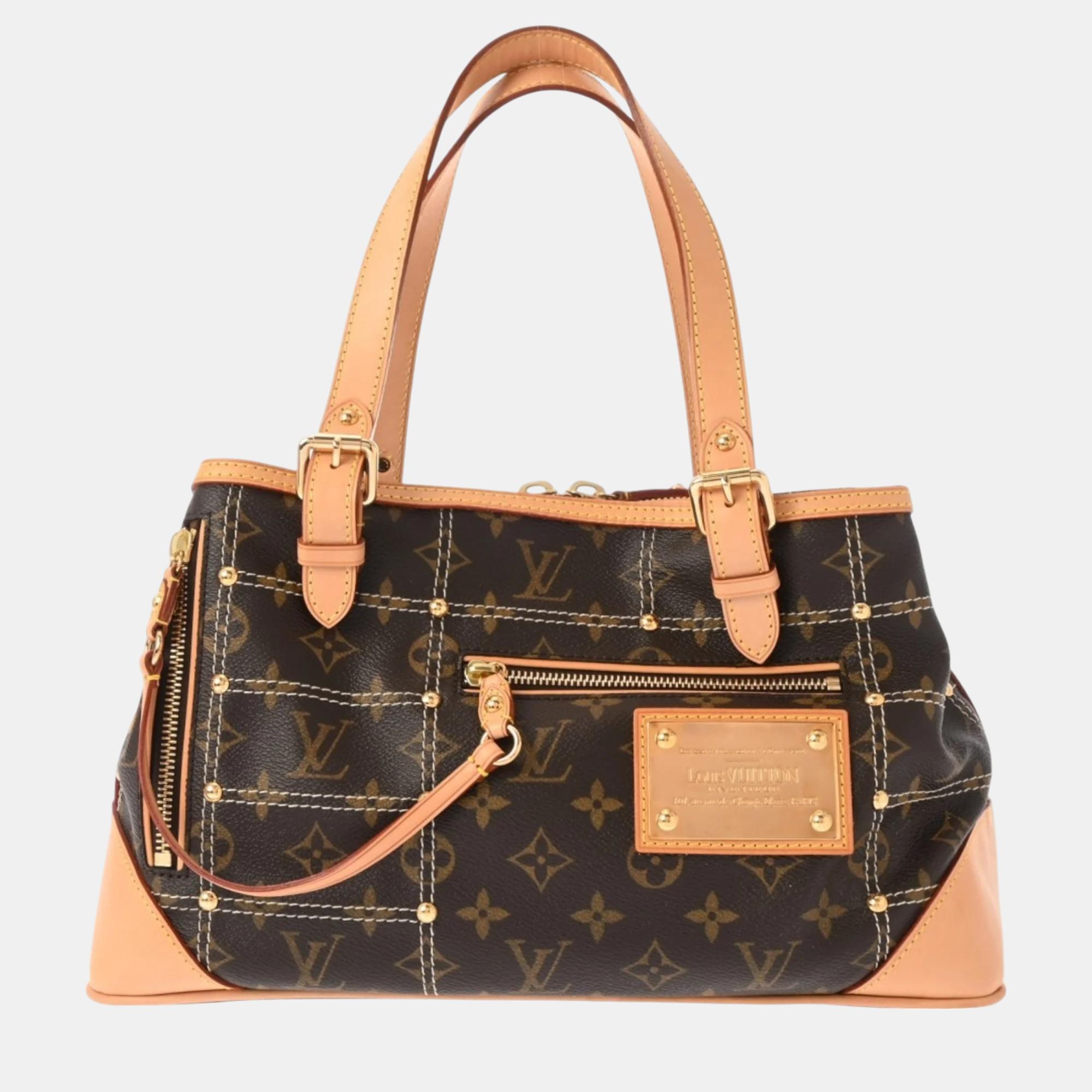 

Louis Vuitton Brown Canvas Monogram Rivet Handbag