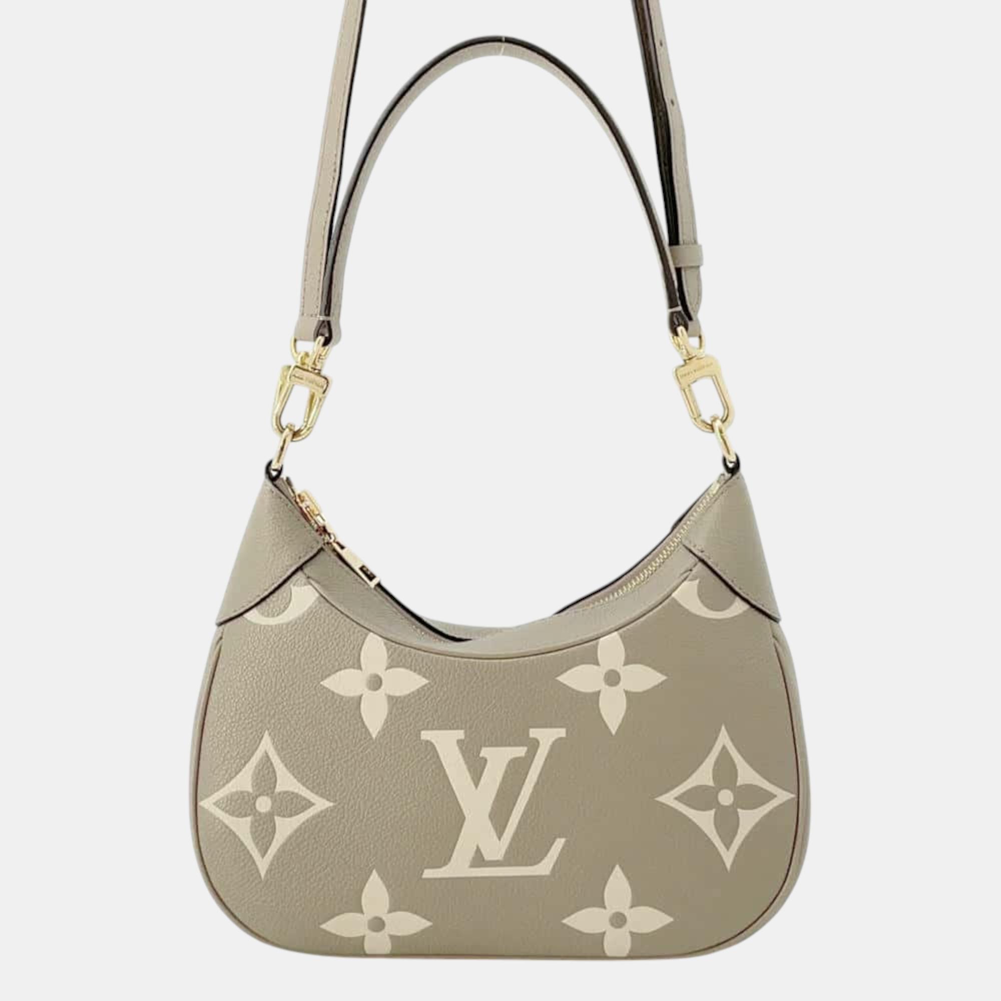 

Louis Vuitton Beige Monogram Empreinte Leather Bagatelle Size NM