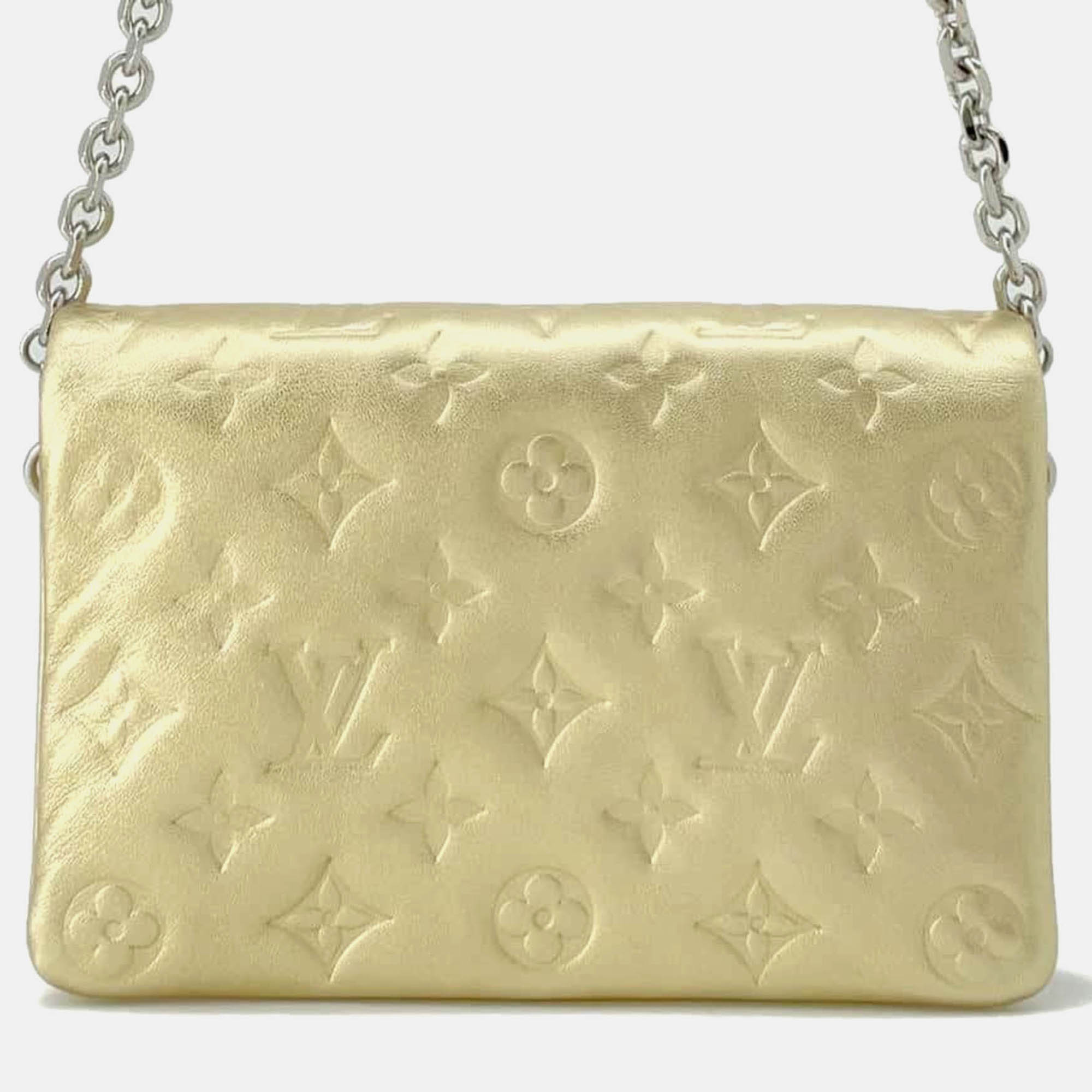 

Louis Vuitton Gold Monogram Lamb Leather Pochette Coussin