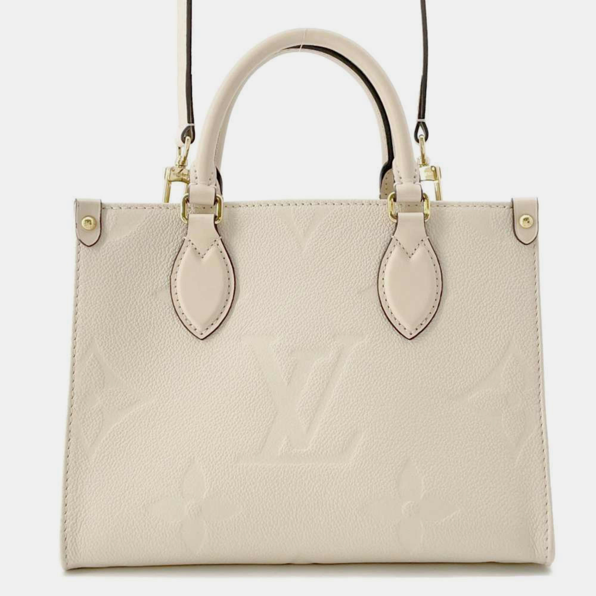 

Louis Vuitton Ivory Monogram Empreinte On the Go PM Shoulder Bag, Cream