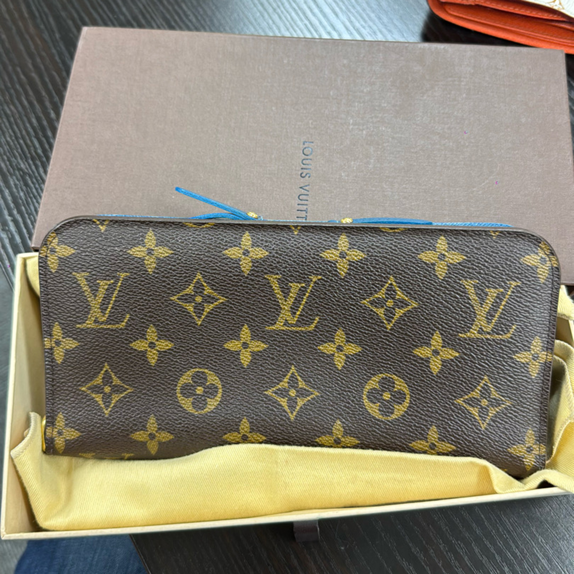 

Louis Vuitton Monogram Insolite Wallet, Brown