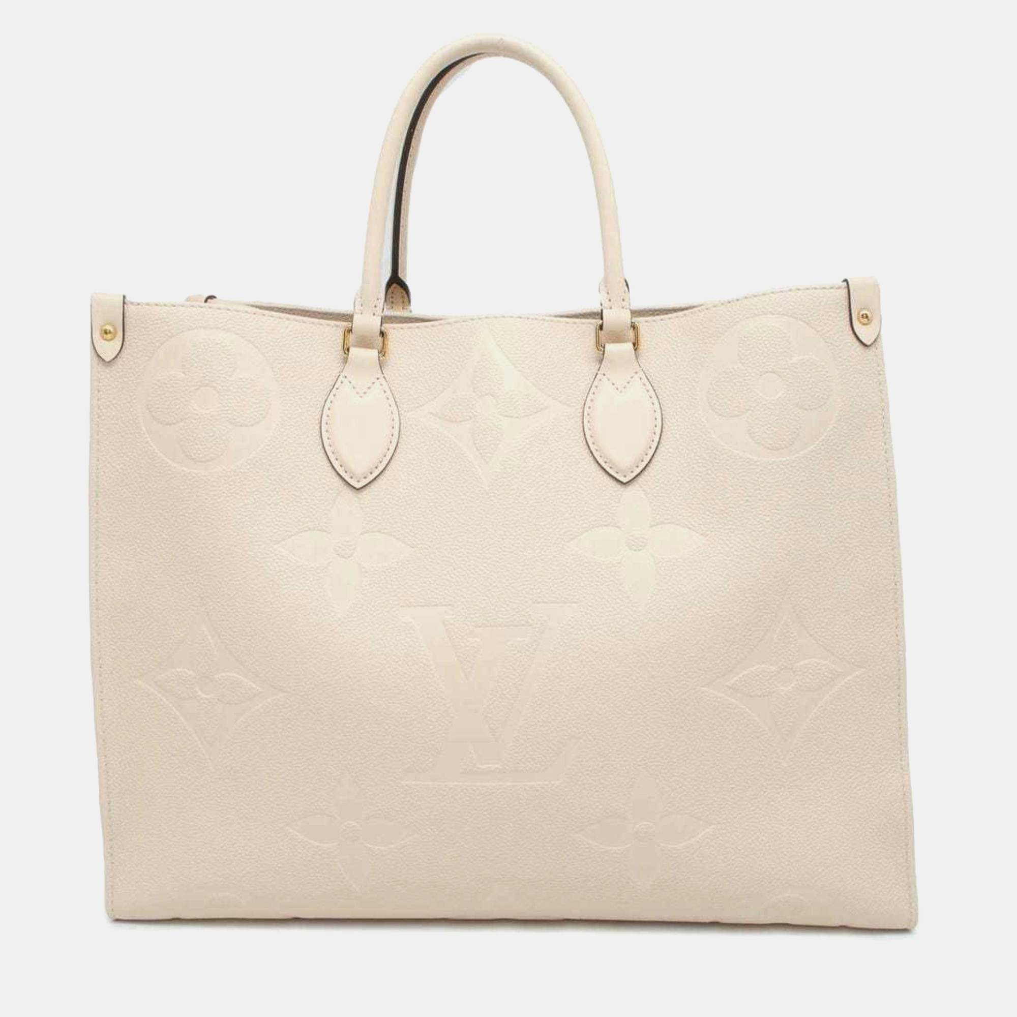 

Louis Vuitton Ivory Monogram Empreinte On The Go Gm Tote Bag, Beige