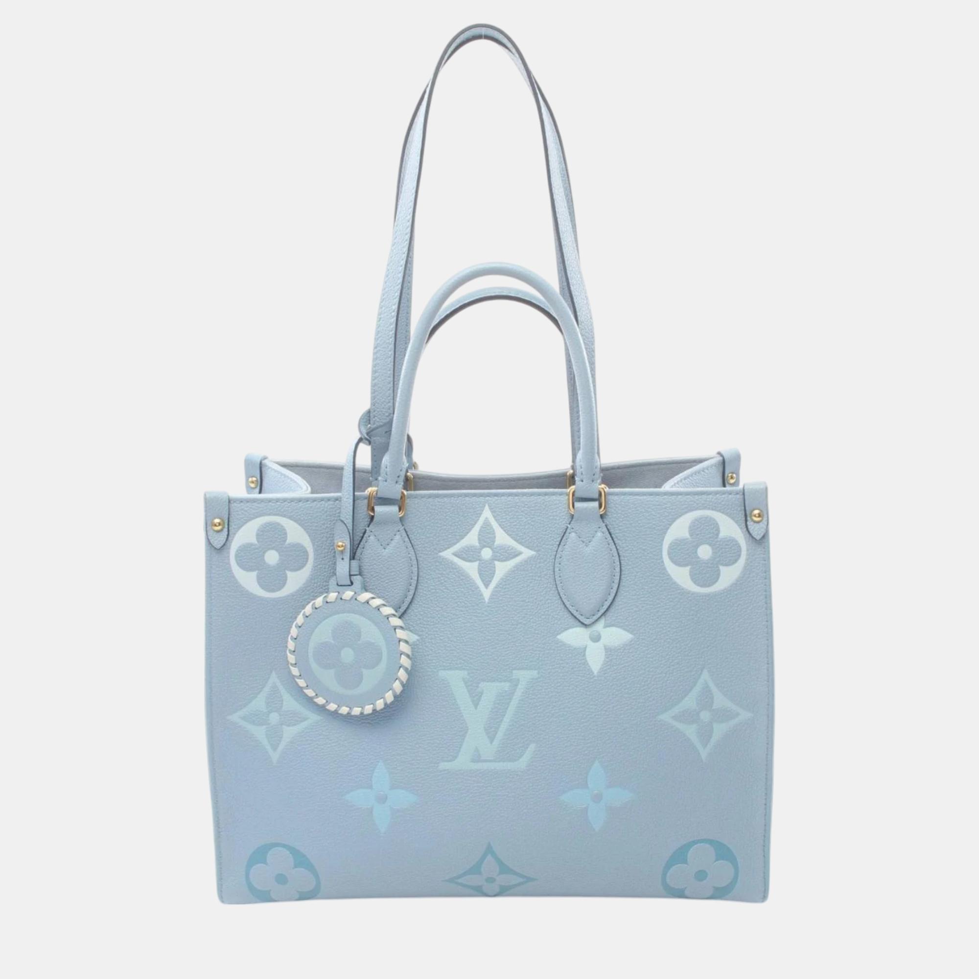 

Louis Vuitton Blue Summer Leather Monogram Empreinte On The Go Mm Tote Bag