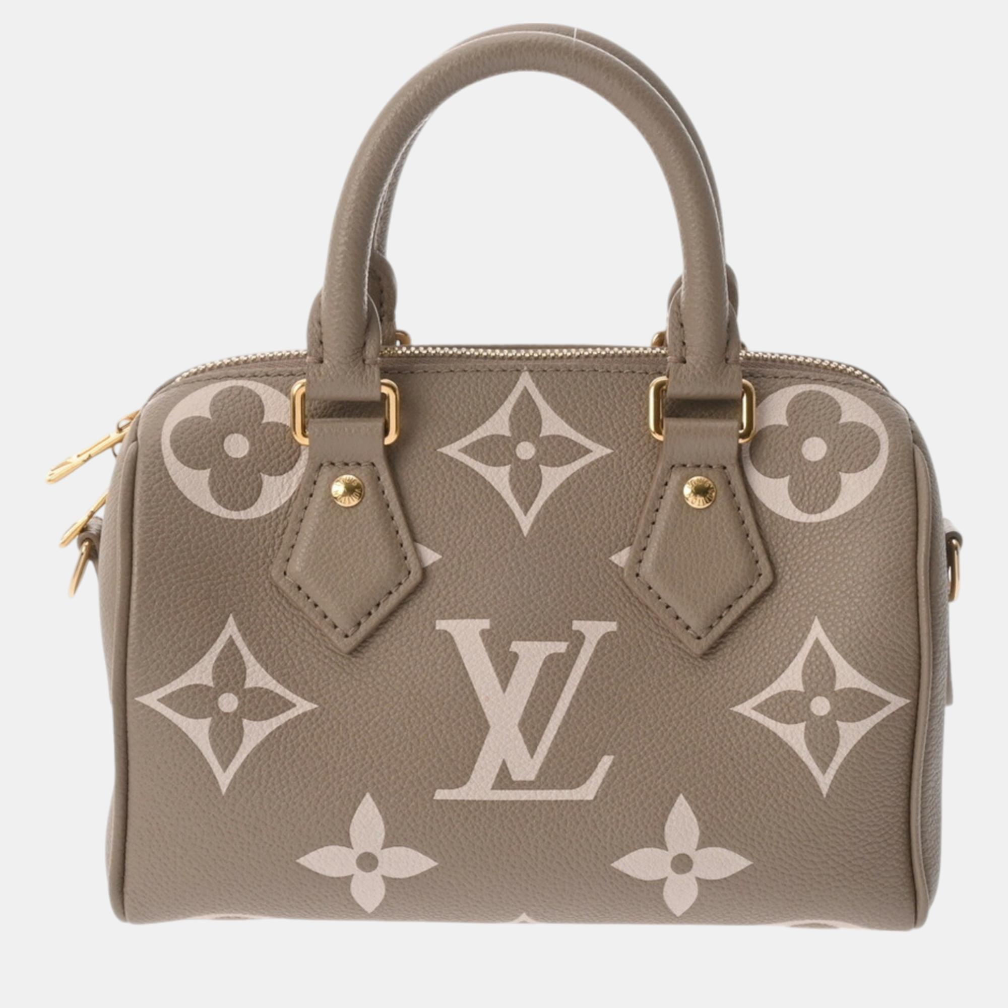 

Louis Vuitton Tourtrell Creme Leather Monogram Empreinte Speedy Bandouliere 20 Handbag, Cream