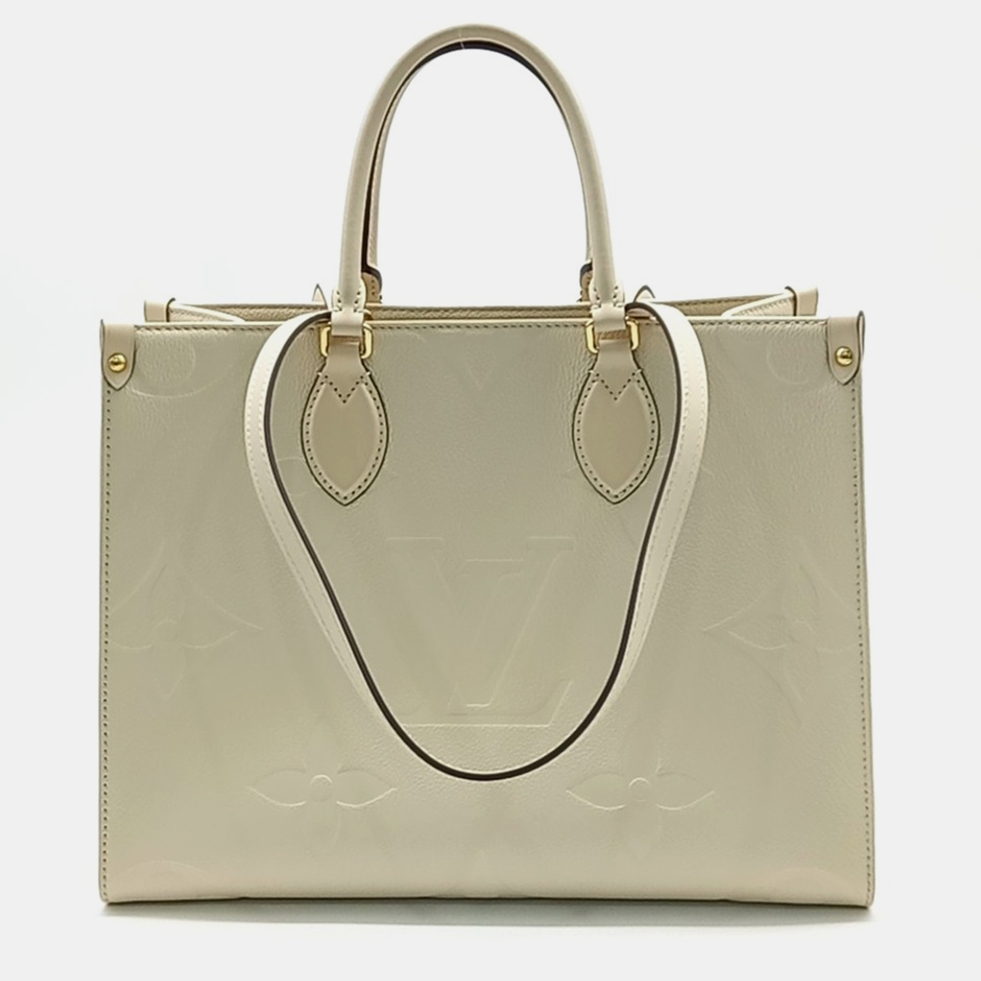 

Louis Vuitton Beige Leather Empreinte On The Go MM Bag