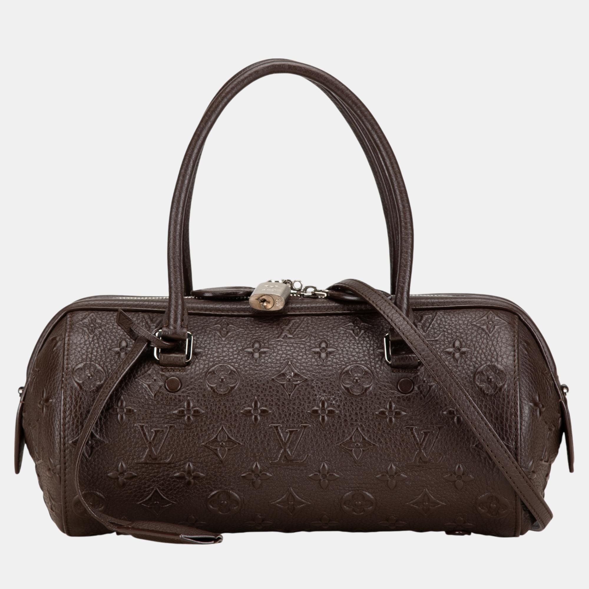 

Louis Vuitton Brown Monogram Revelation Neo Papillon PM