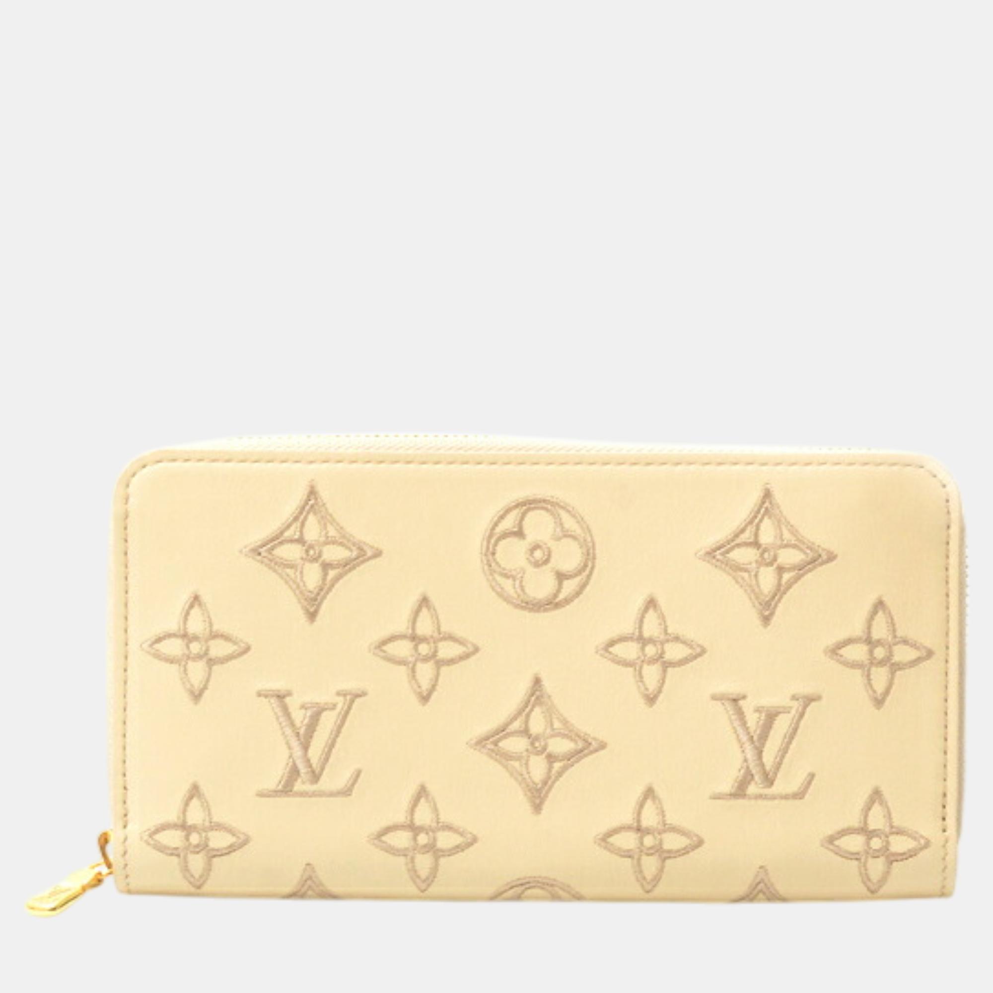 

Louis Vuitton Beige Canvas Monogram Zippy Wallet