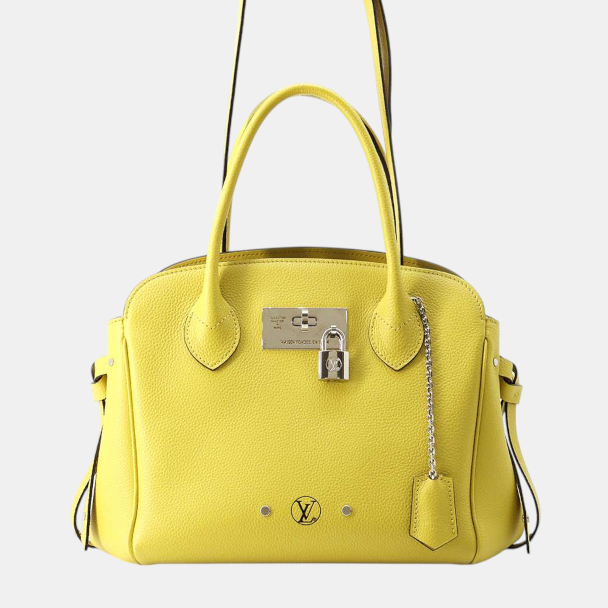 

Louis Vuitton Vert Acid Grain Leather Milla Bag Size Pm, Yellow