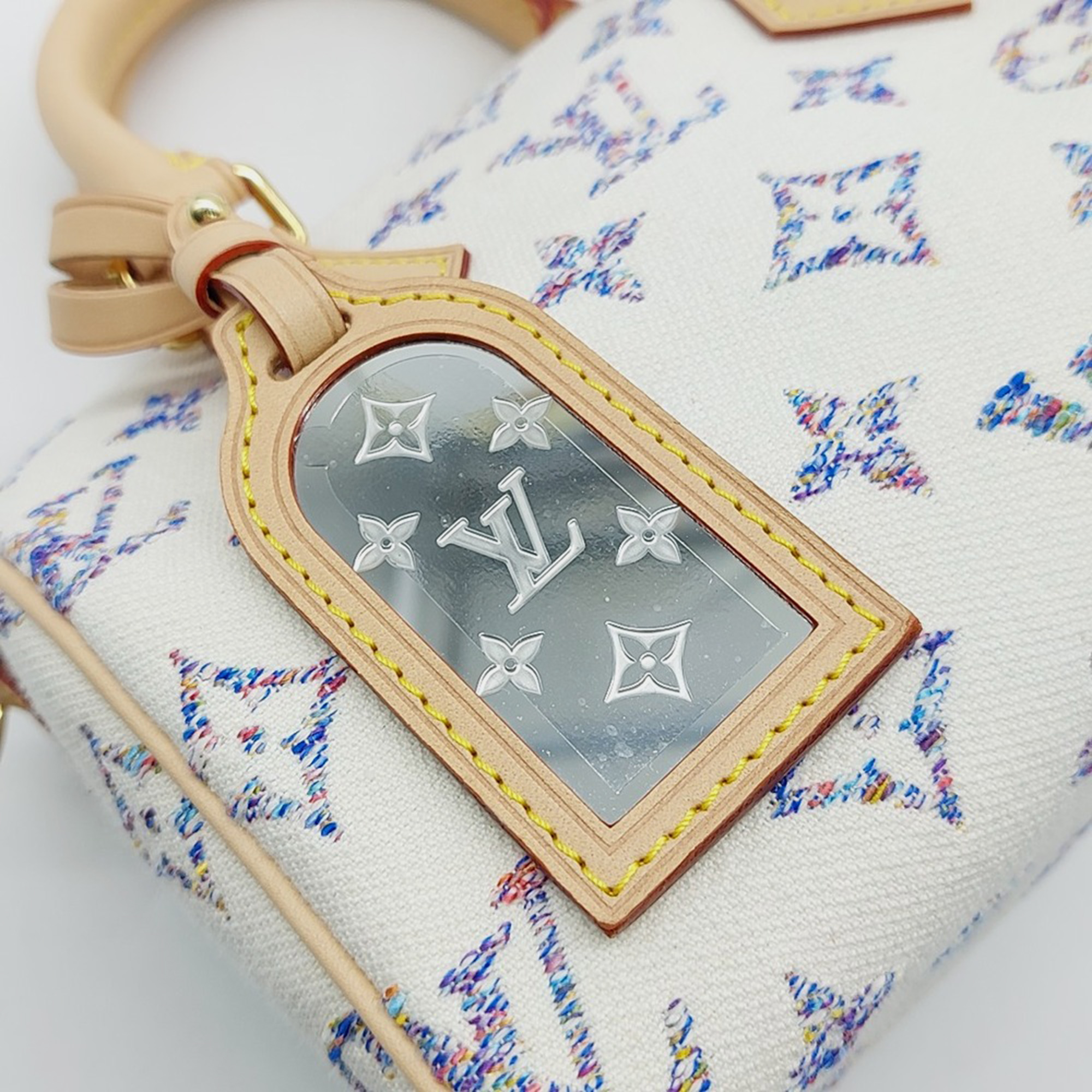 Louis Vuitton Multicolor White Canvas and Leather Louis Vuitton Multicolor White Fabric Bandouliere Speedy 20 bag 