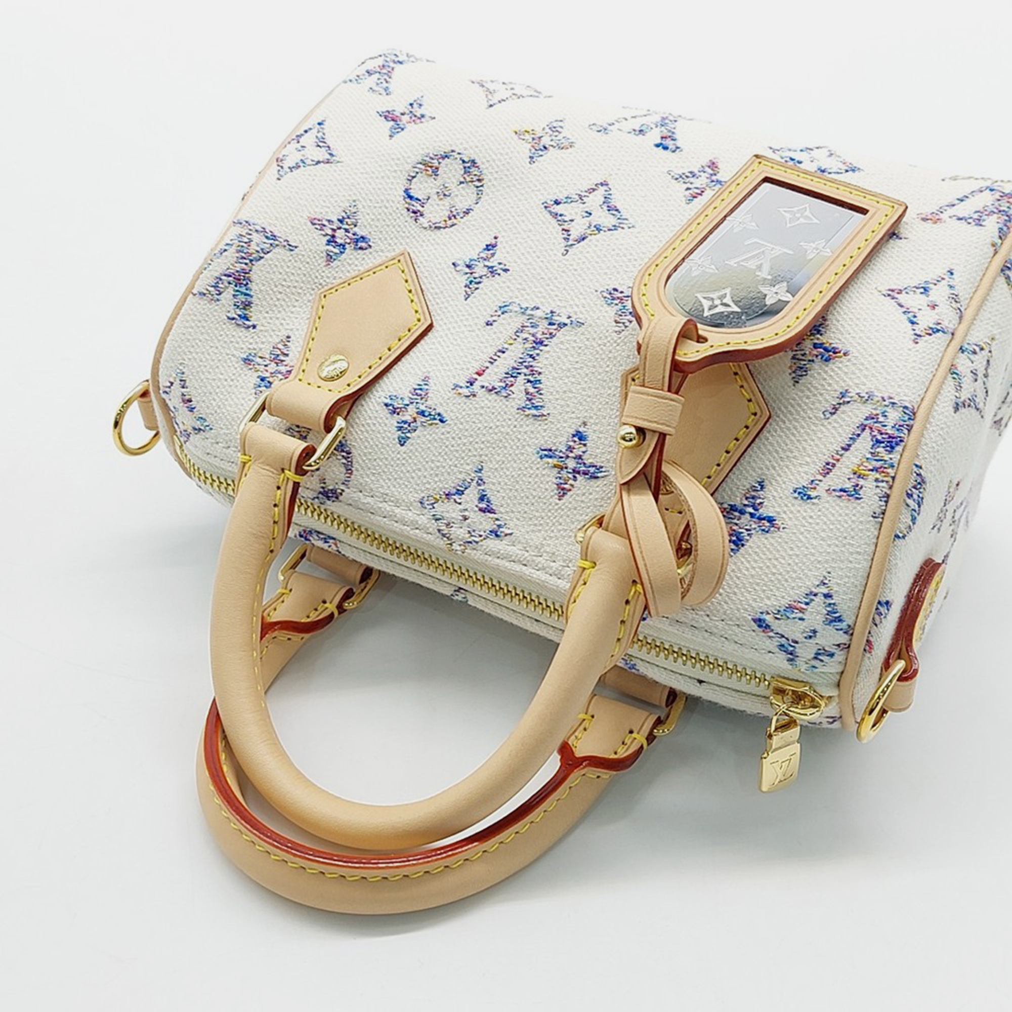 Louis Vuitton Multicolor White Canvas and Leather Louis Vuitton Multicolor White Fabric Bandouliere Speedy 20 bag 