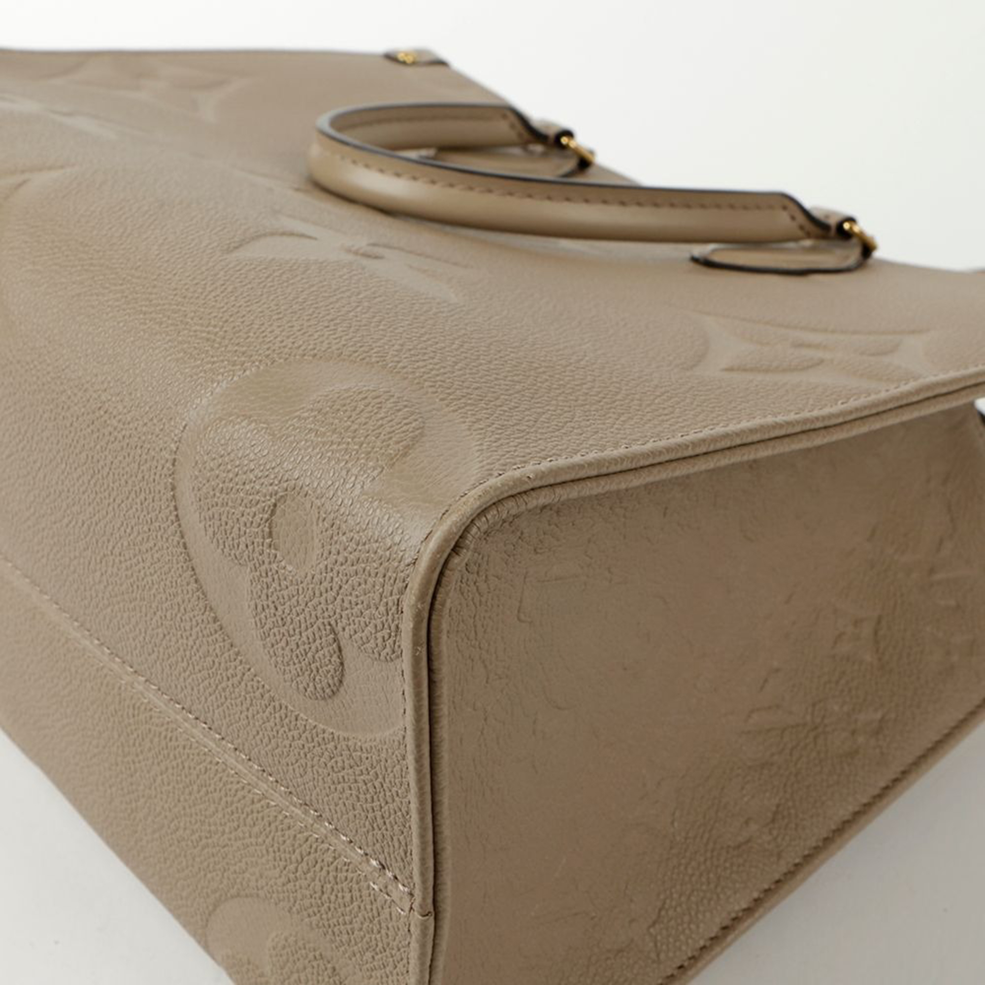 Louis Vuitton Tourterelle Empreinte Monogram Leather OnTheGo MM Tote Bag 