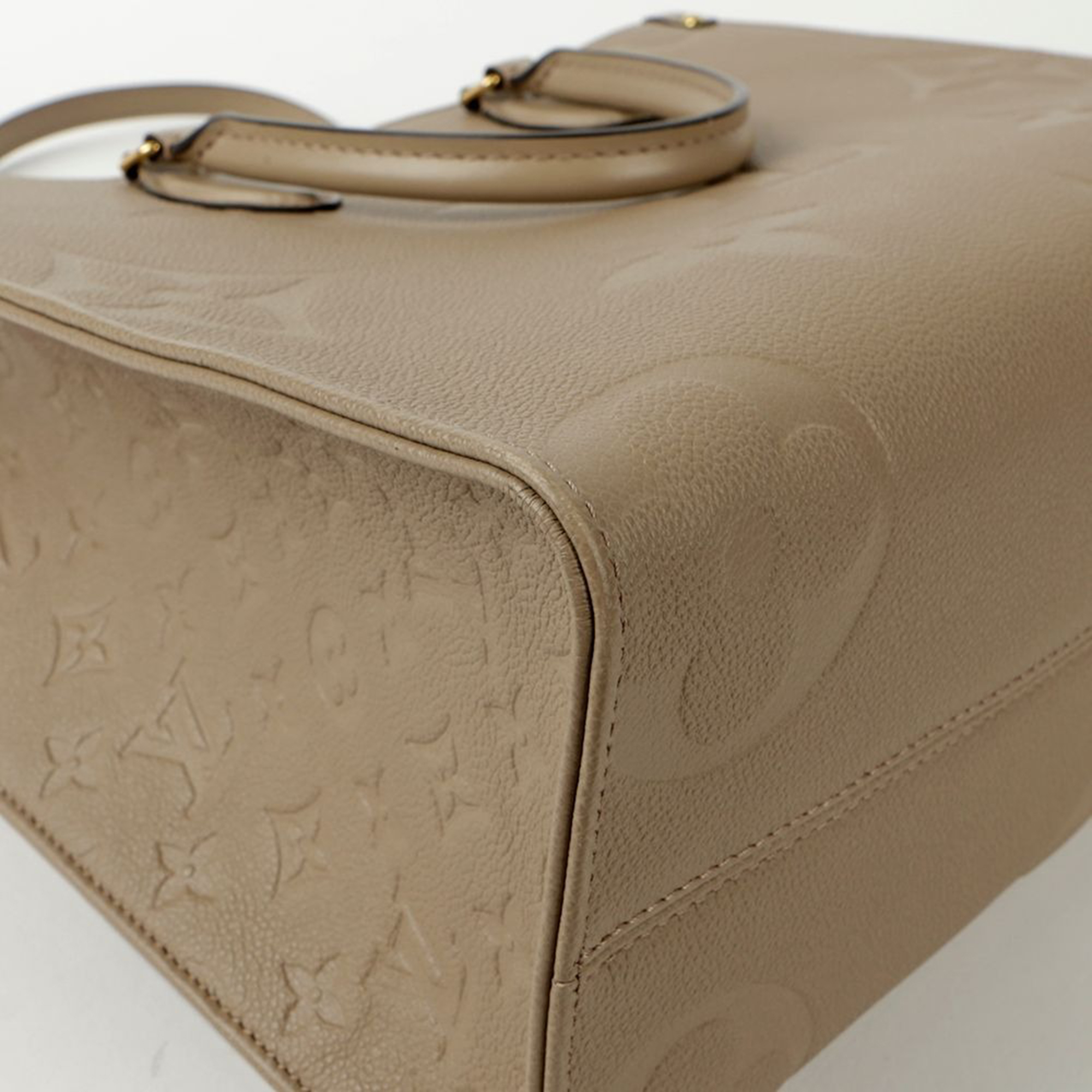 Louis Vuitton Tourterelle Empreinte Monogram Leather OnTheGo MM Tote Bag 