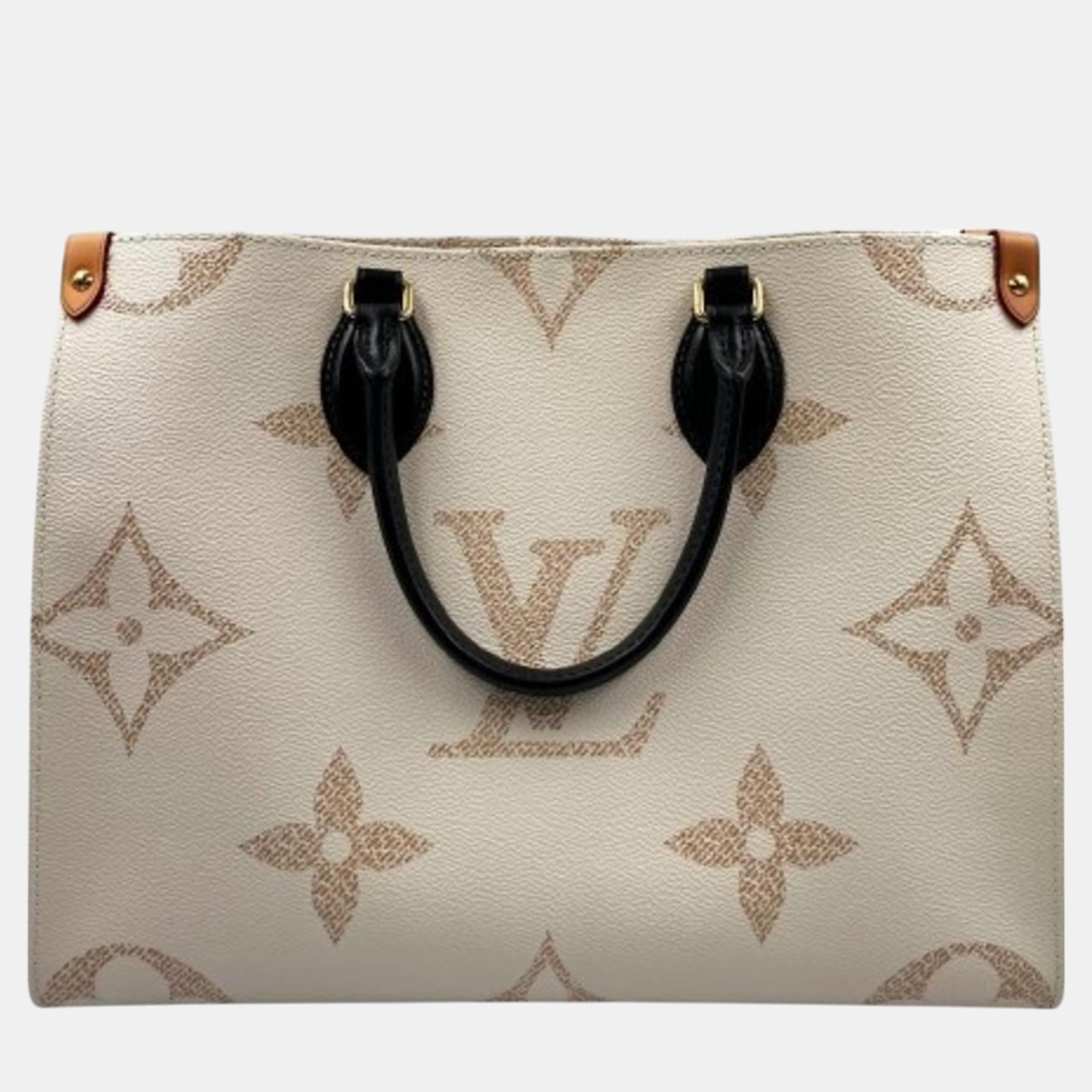 

Louis Vuitton On The Go Mm Dune White Beige