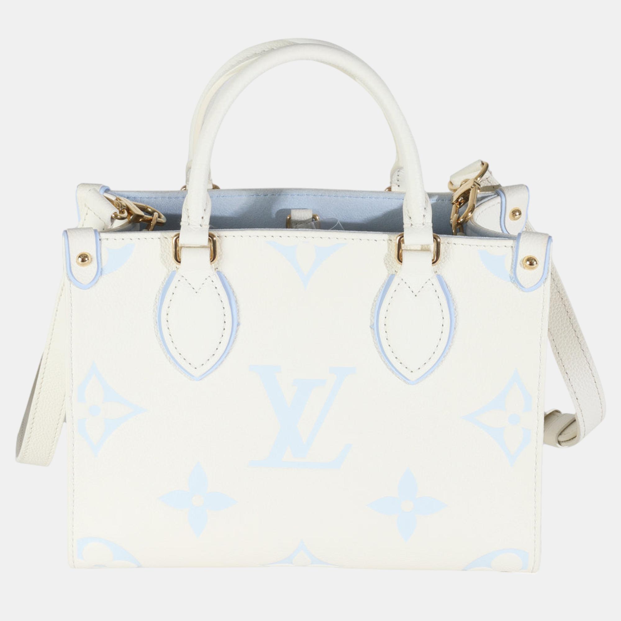 

Louis Vuitton Latte Candy Blue Monogram Giant Empreinte Onthego PM Bag, White