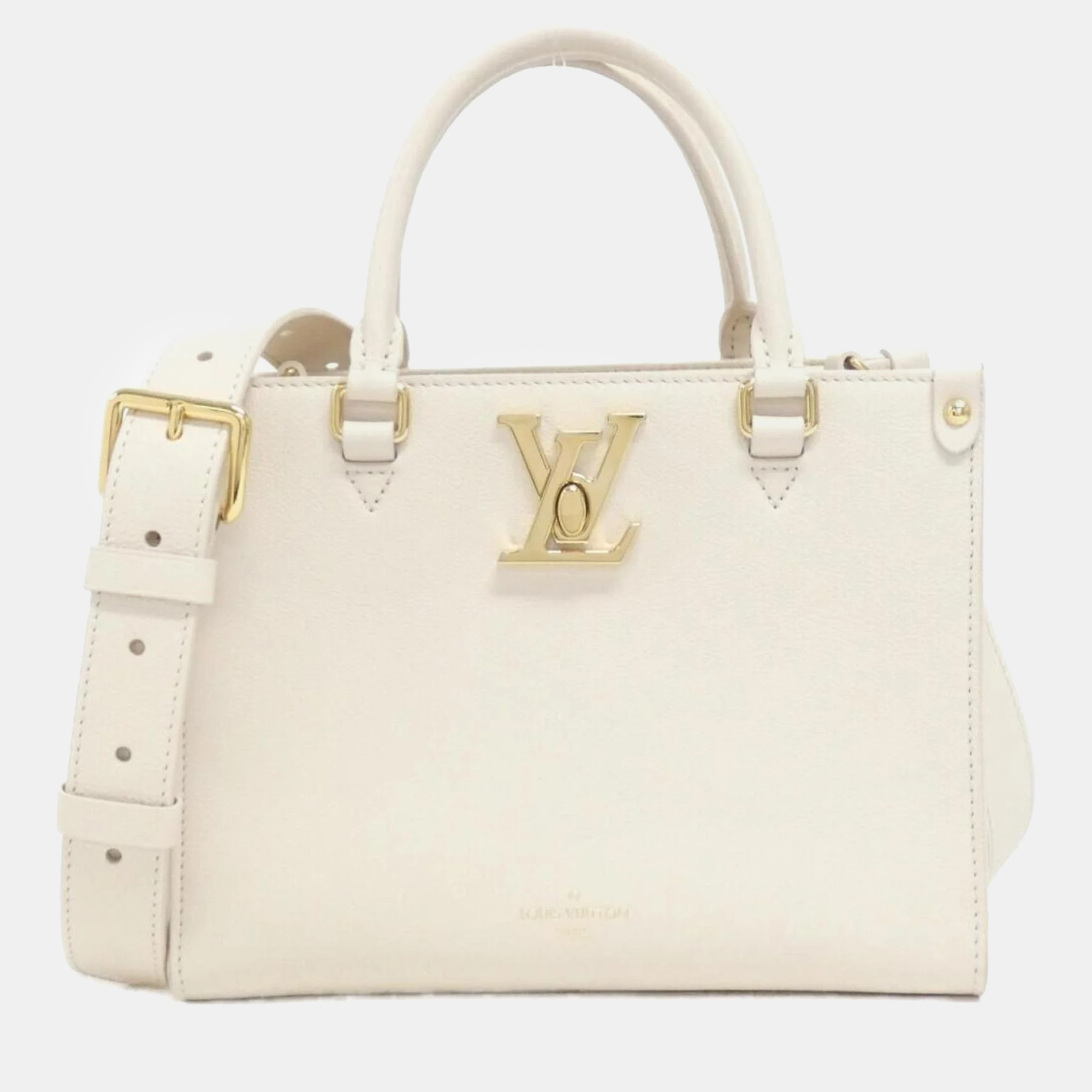 

Louis Vuitton Leather Rock & Go Handbag, Beige