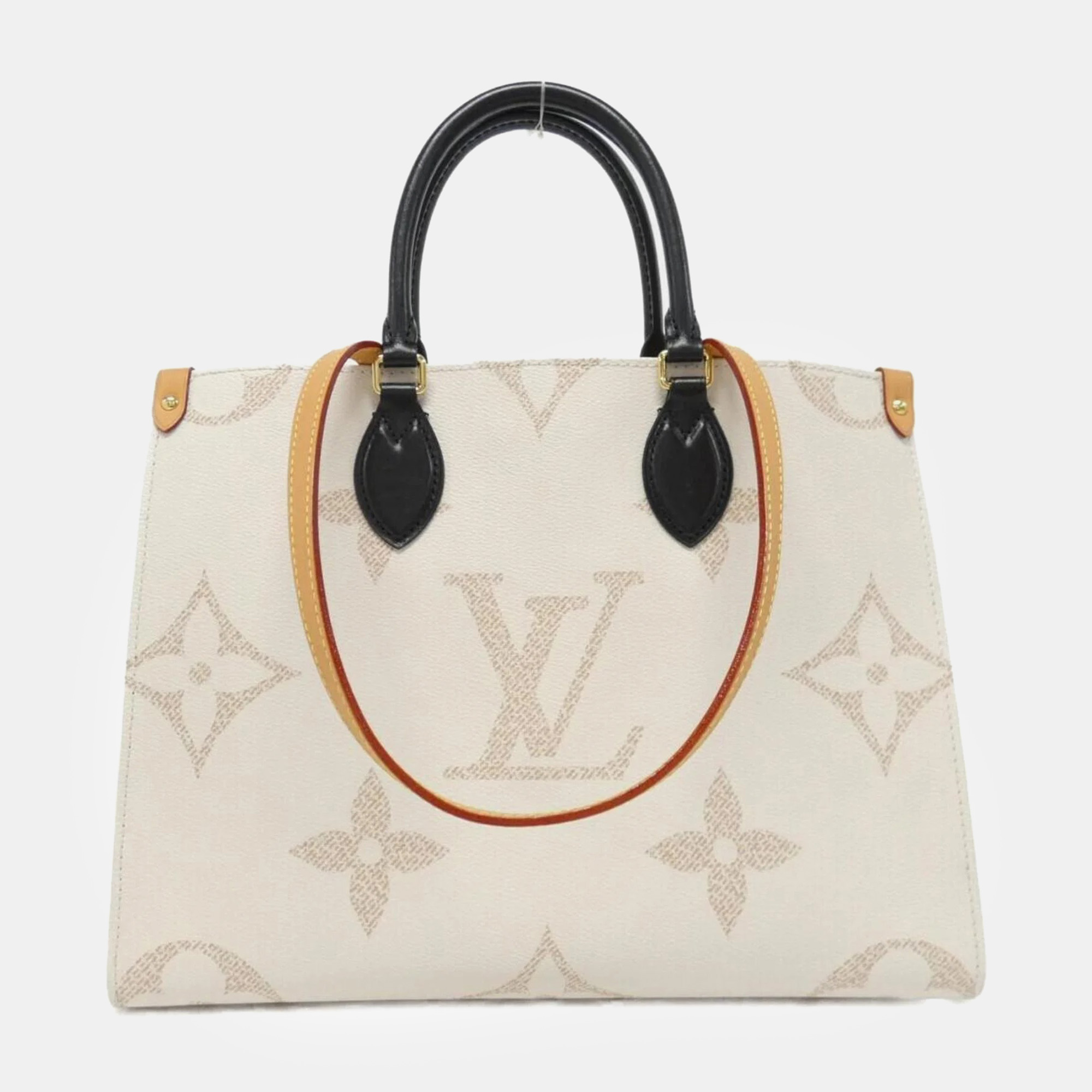 

Louis Vuitton Monogram Canvas Dune OnTheGo MM Handbag, Beige