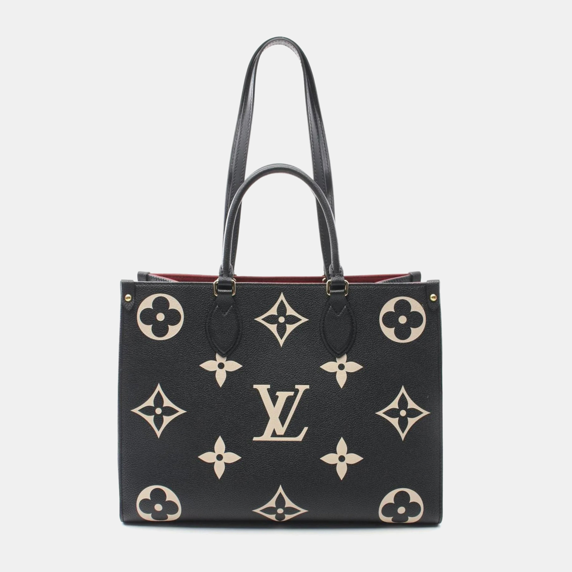 

Louis Vuitton Black/Beige Monogram Empreinte OnTheGo MM