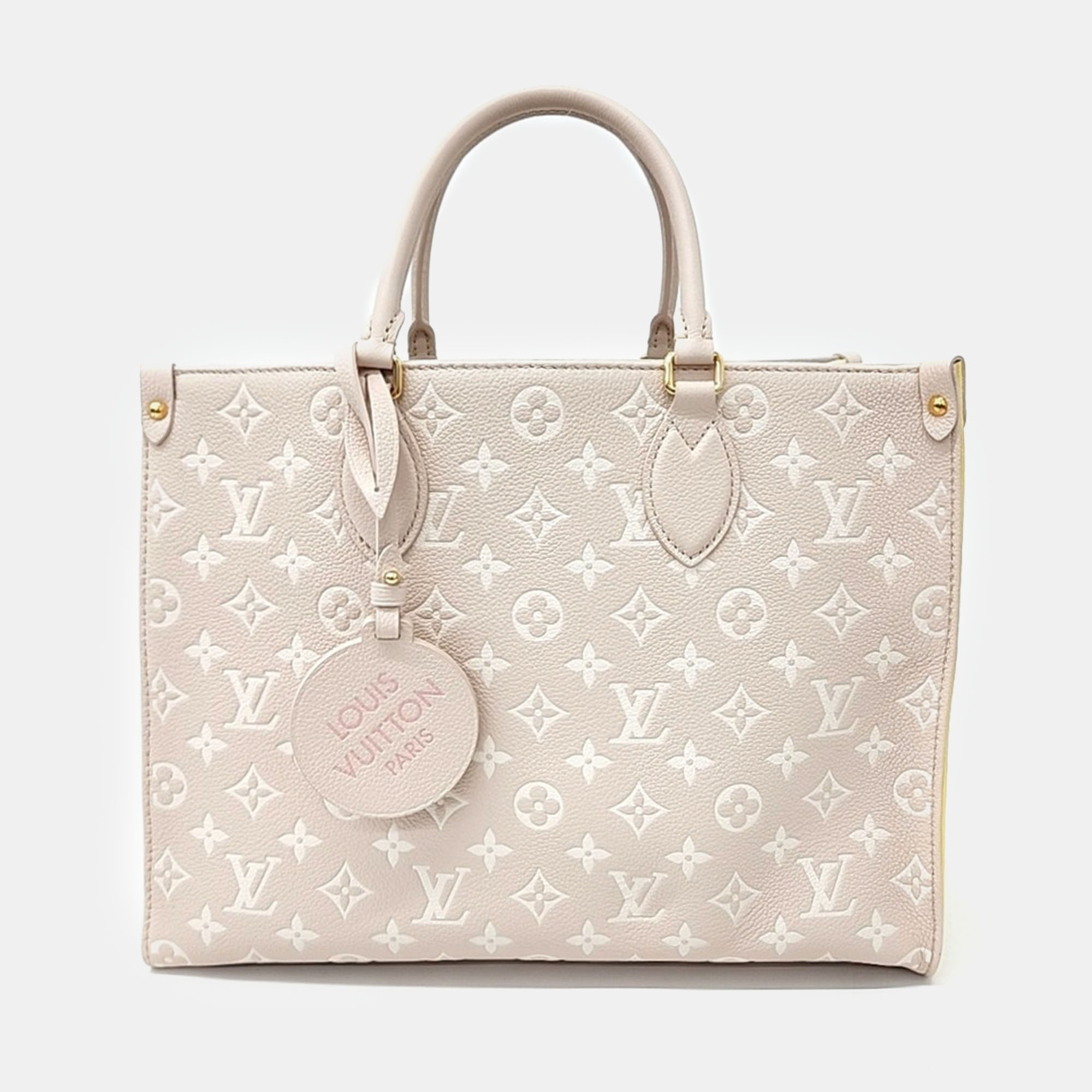 

Louis Vuitton Beige Leather Empreinte On The Go MM bag