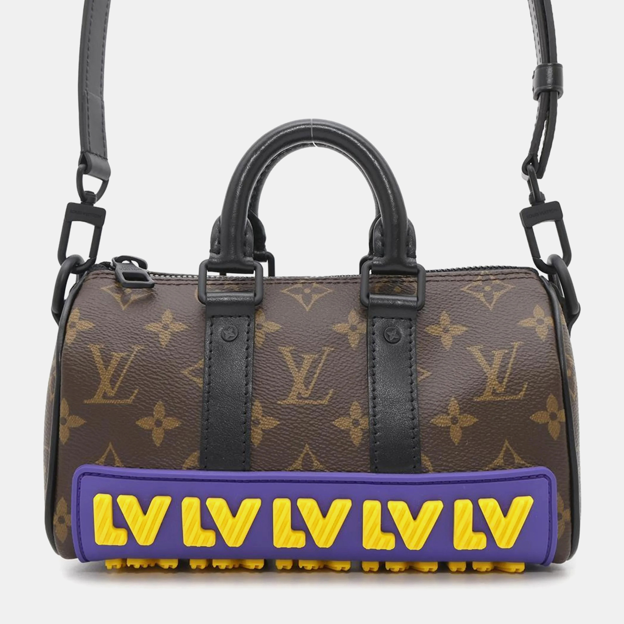 

Louis Vuitton Monogram Lv Rubber Keepall  Black/Brown Handbag