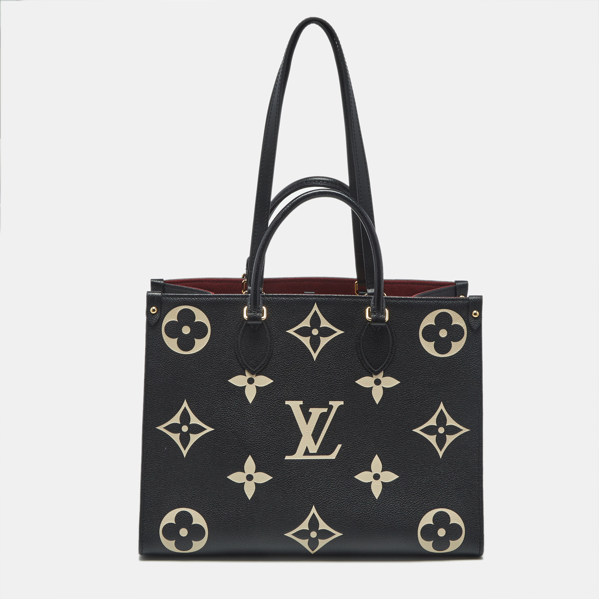 

Louis Vuitton Bicolour Monogram Empreinte Leather OnTheGo MM Bag, Black