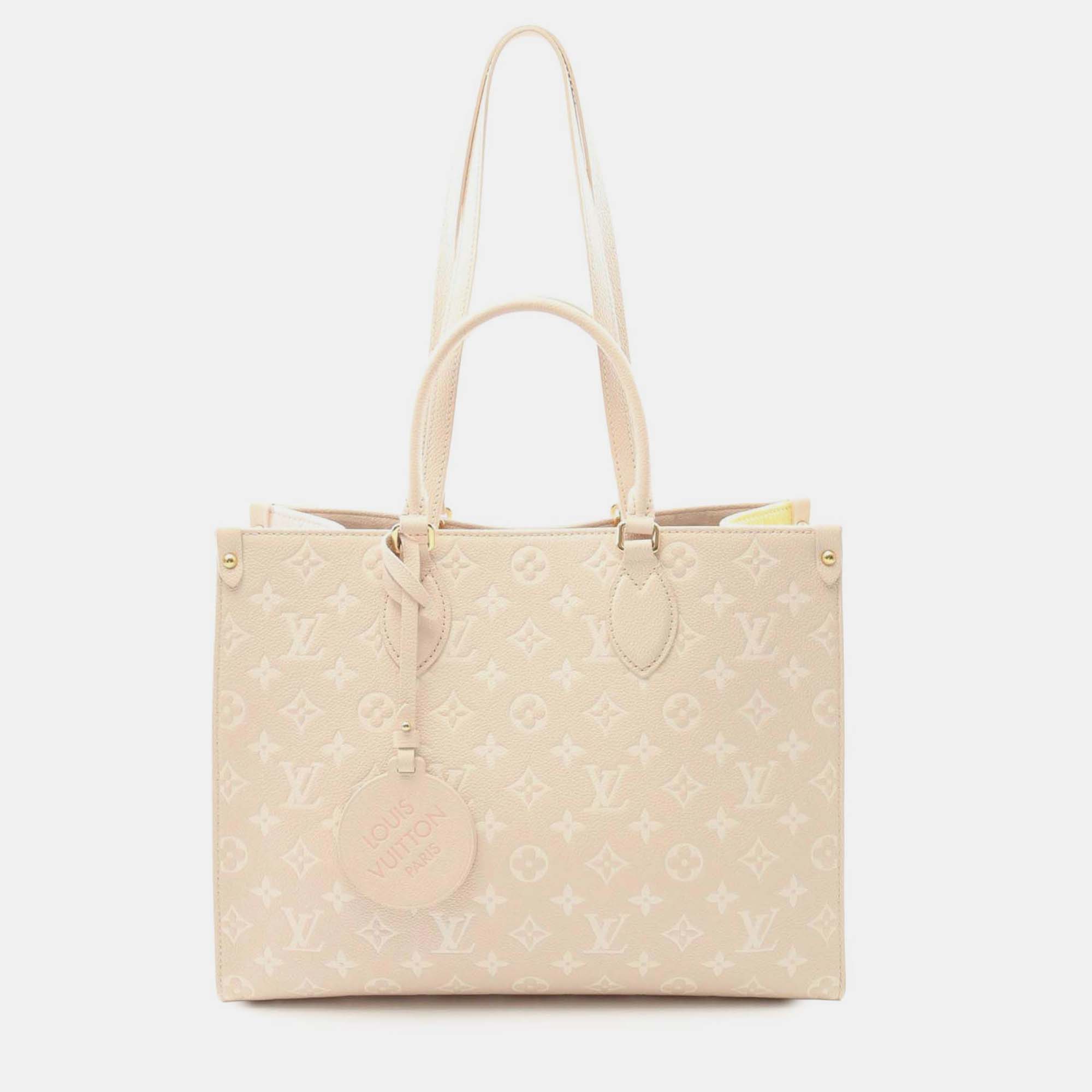 

Louis Vuitton Brown Monogram Empreinte Spring In The City Onthego MM