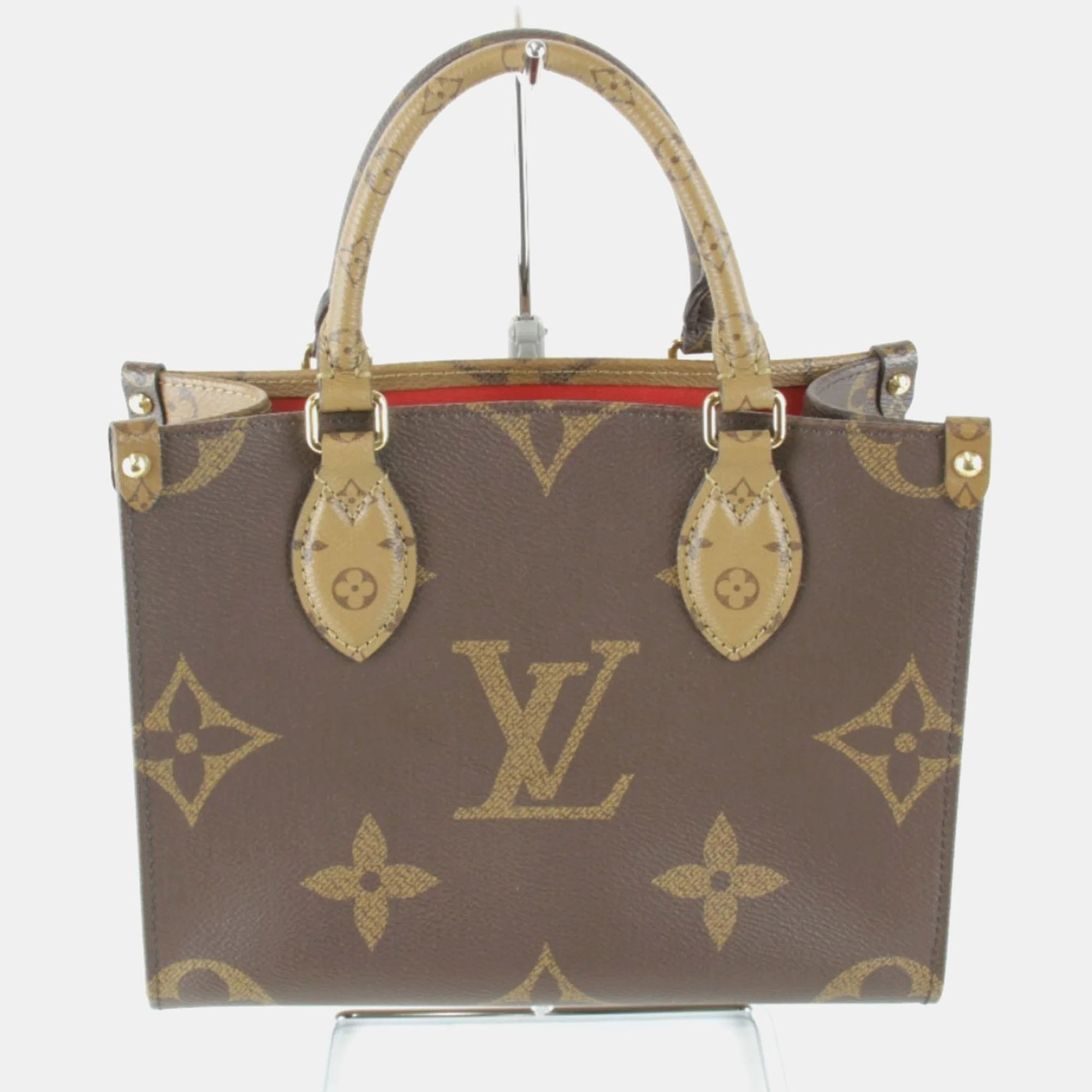 

Louis Vuitton Monogram Canvas Ic Chip OnTheGo PM Handbag, Brown