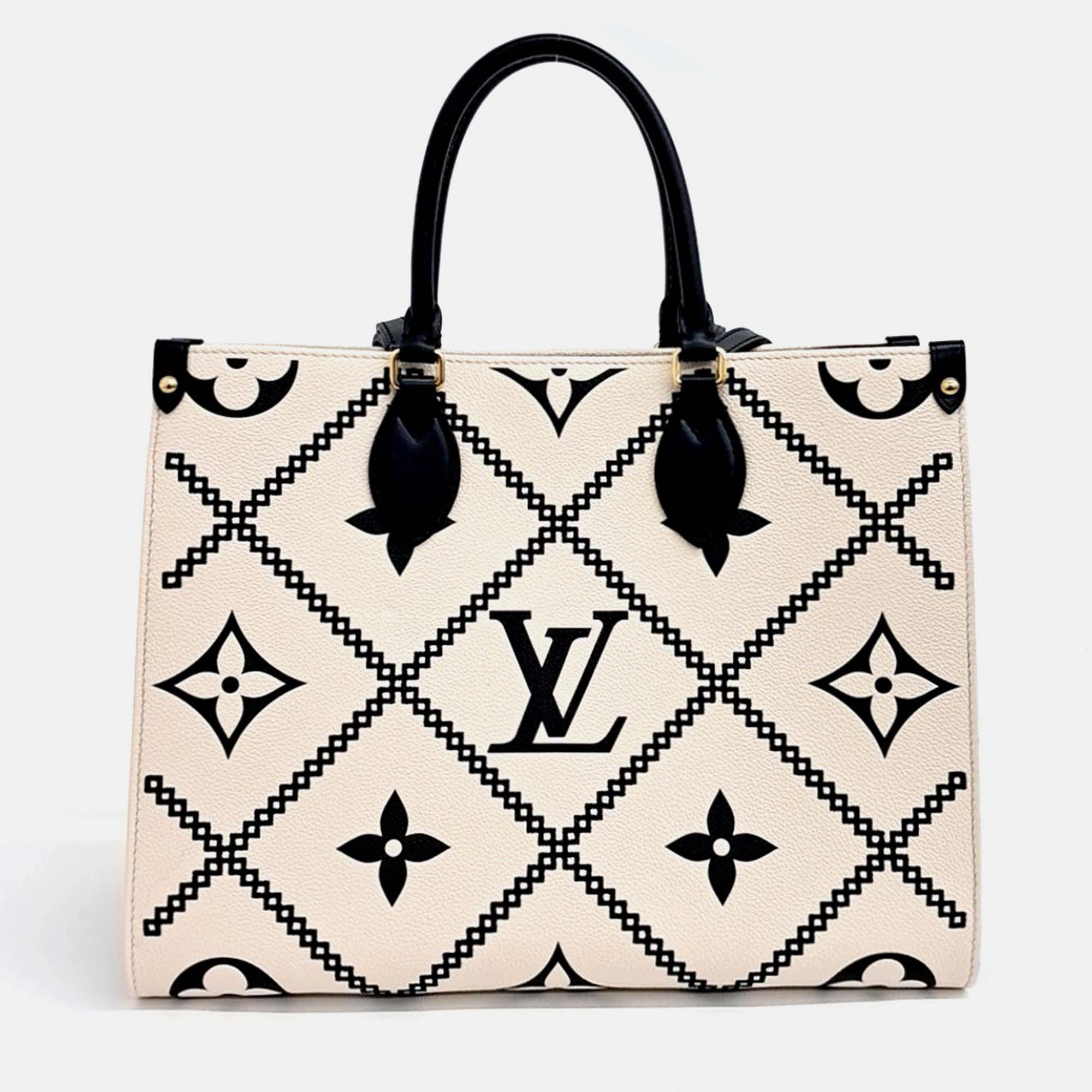 

Louis Vuitton Black White Leather On the Go MM