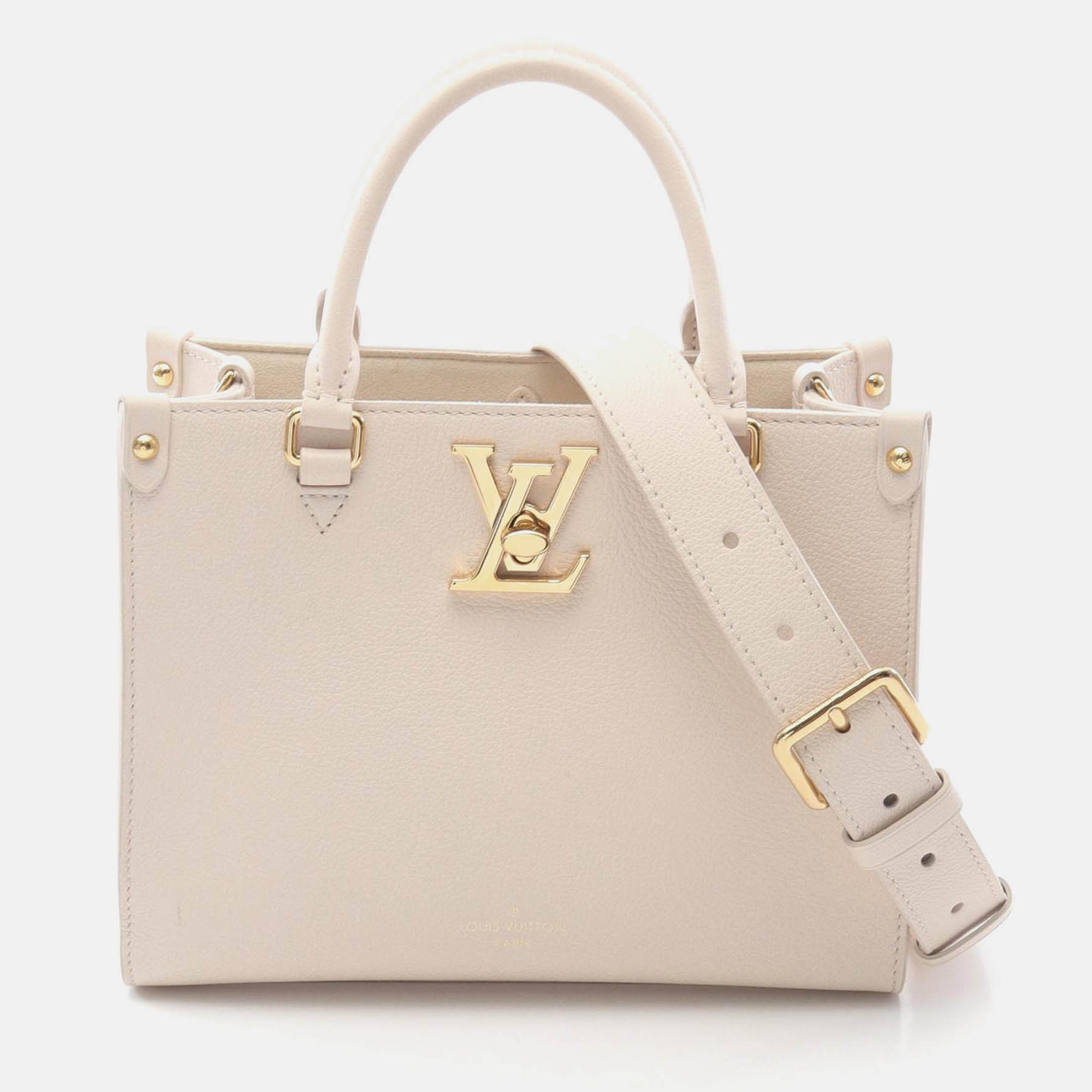 

Louis Vuitton Rock & Go Quartz Shoulder Tote Bag Grain Calfskin Beige