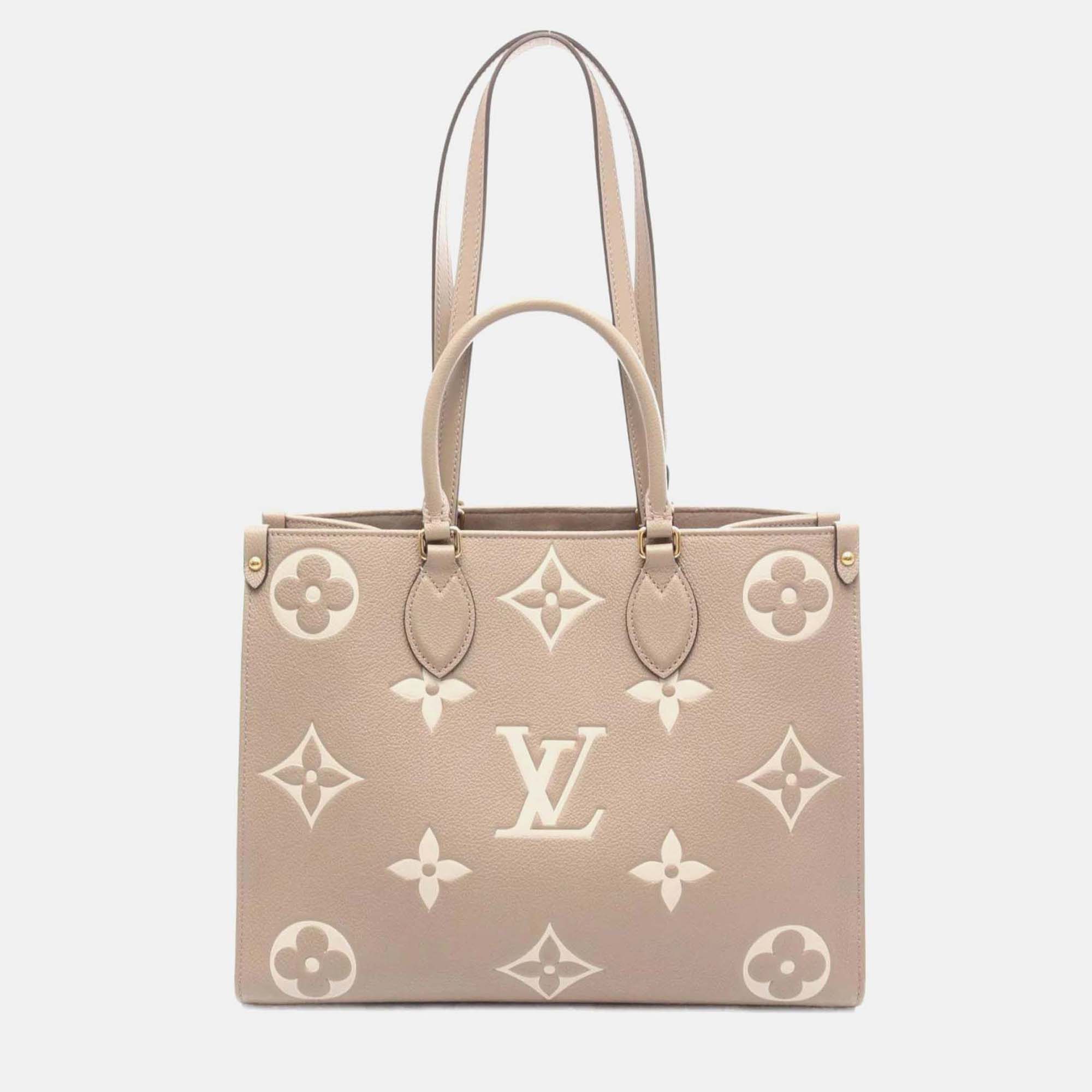 Pre-owned Louis Vuitton On The Go Mm Two-tone Tote Bag In Monogram Empreinte Leather Beige And Ivory In Sand