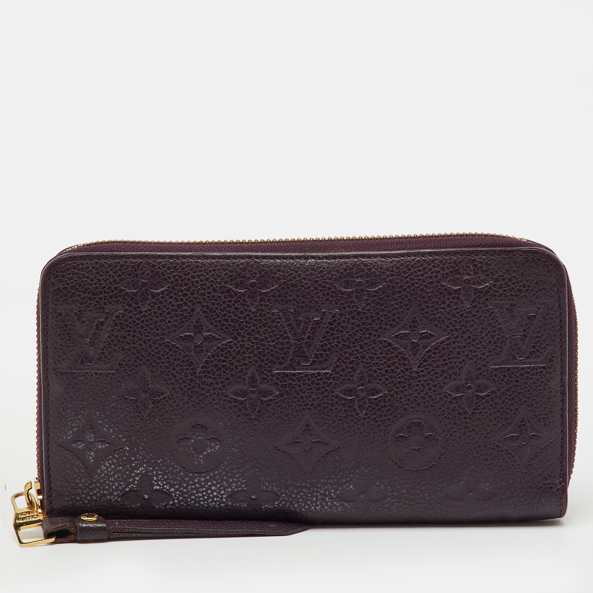 

Louis Vuitton Aube Monogram Empreinte Leather Zippy Wallet, Purple