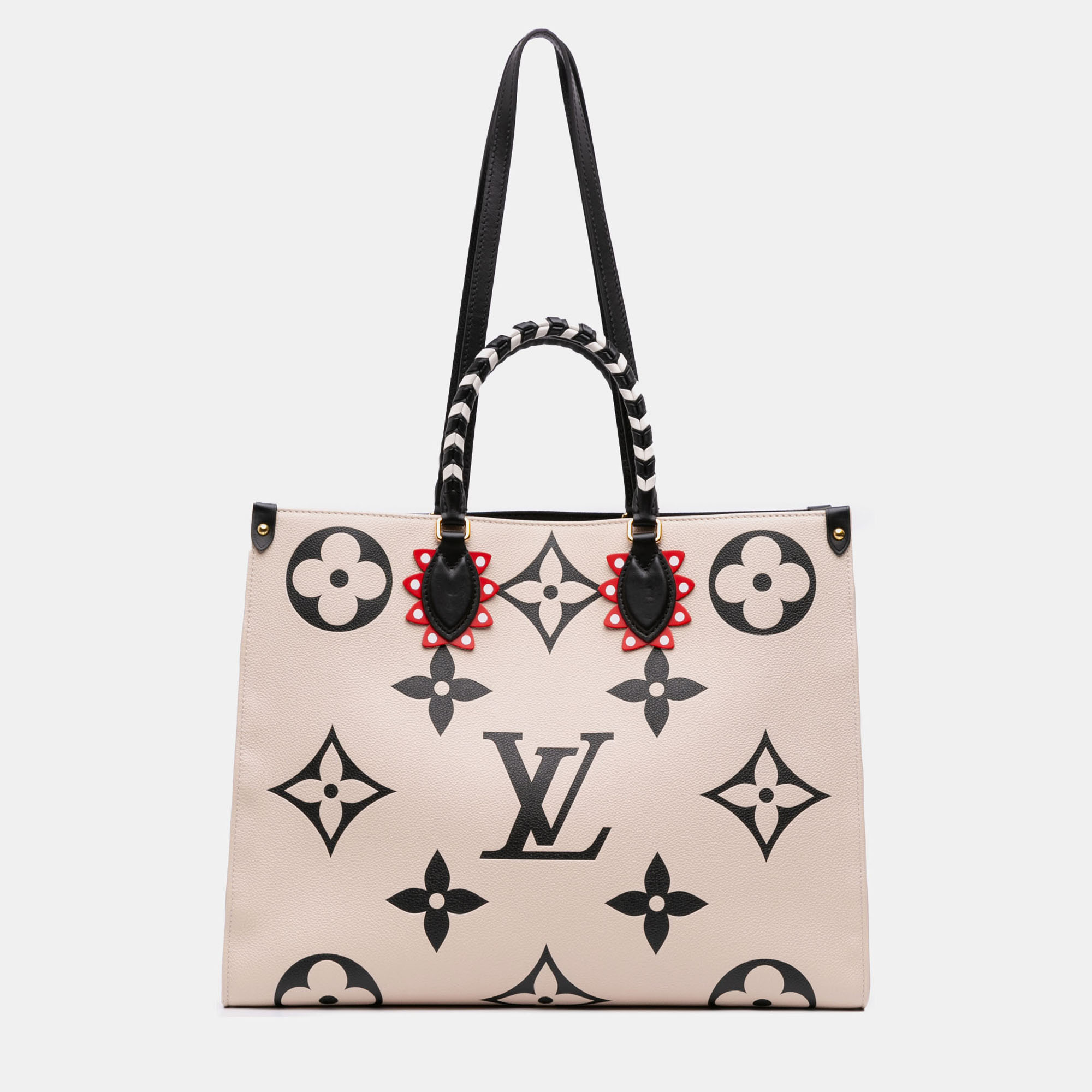 

Louis Vuitton Beige Monogram Empreinte Giant Crafty Onthego GM