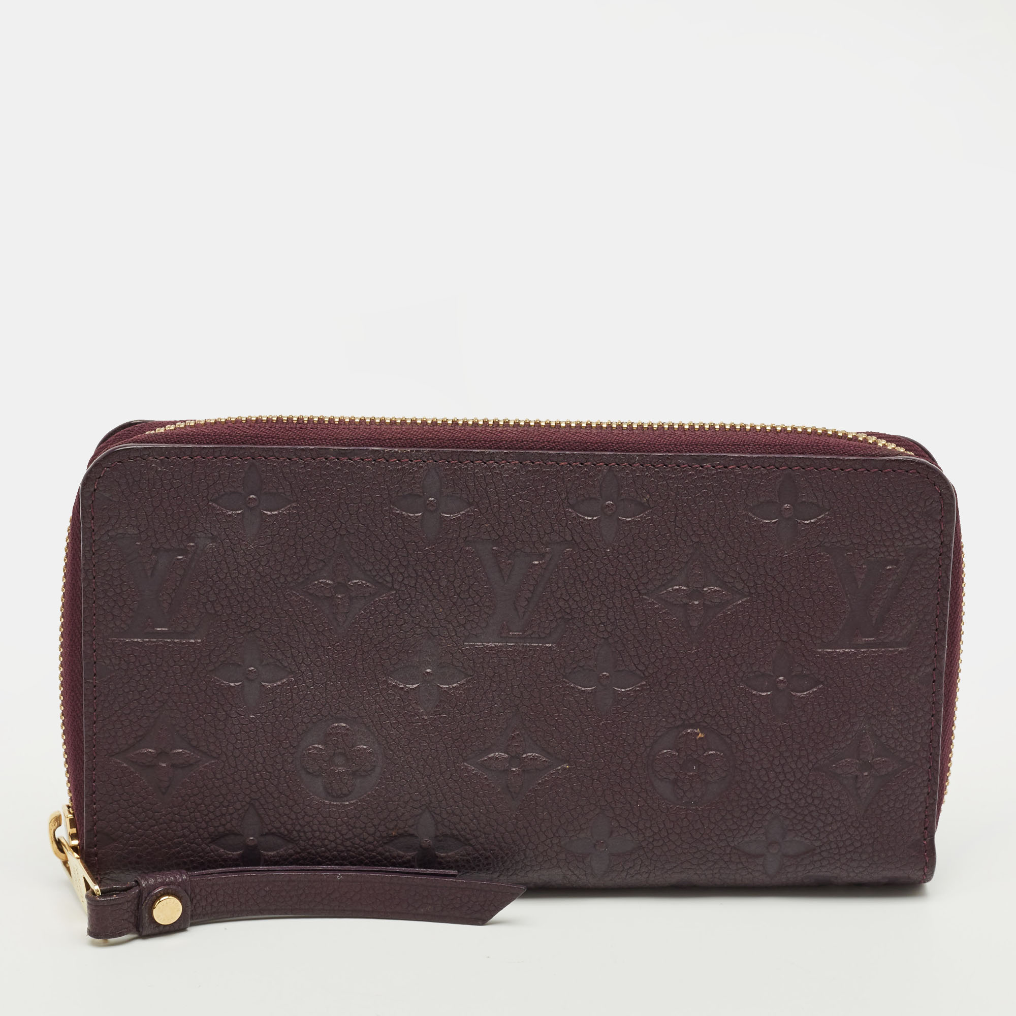 

Louis Vuitton Aube Monogram Empreinte Leather Zippy Wallet, Purple