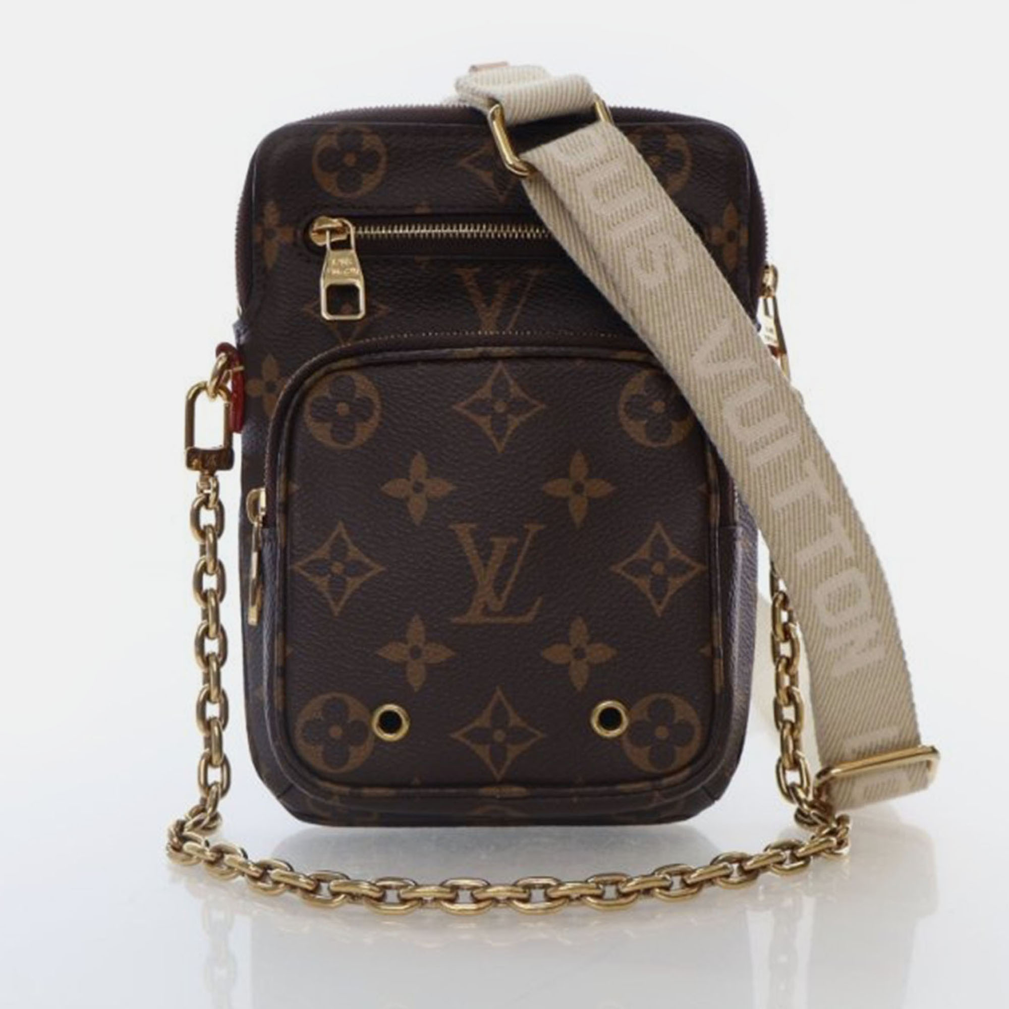 

Louis Vuitton Monogram Utility Phone Sleeve, Brown