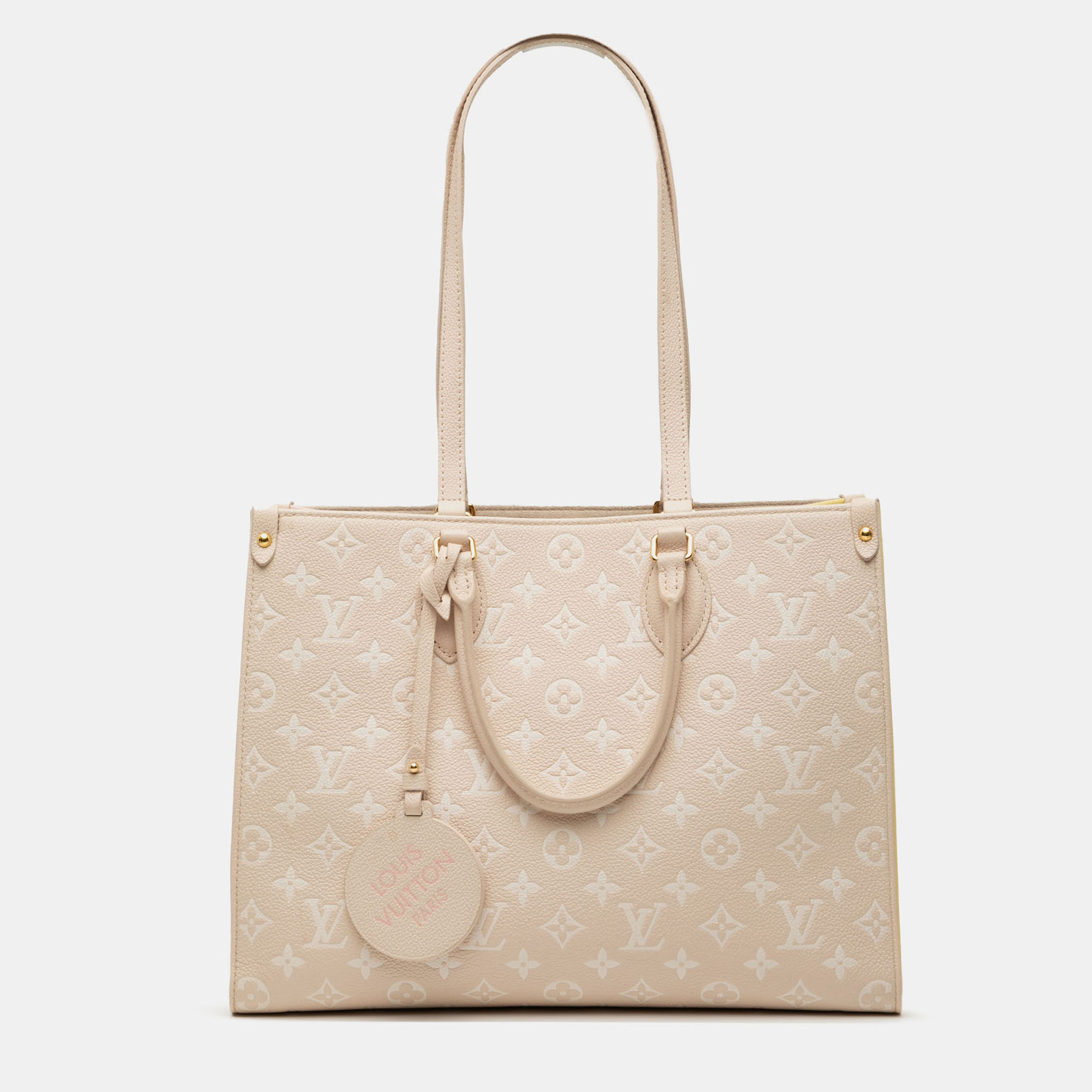 

Louis Vuitton Beige Monogram Empreinte Spring In The City Onthego MM