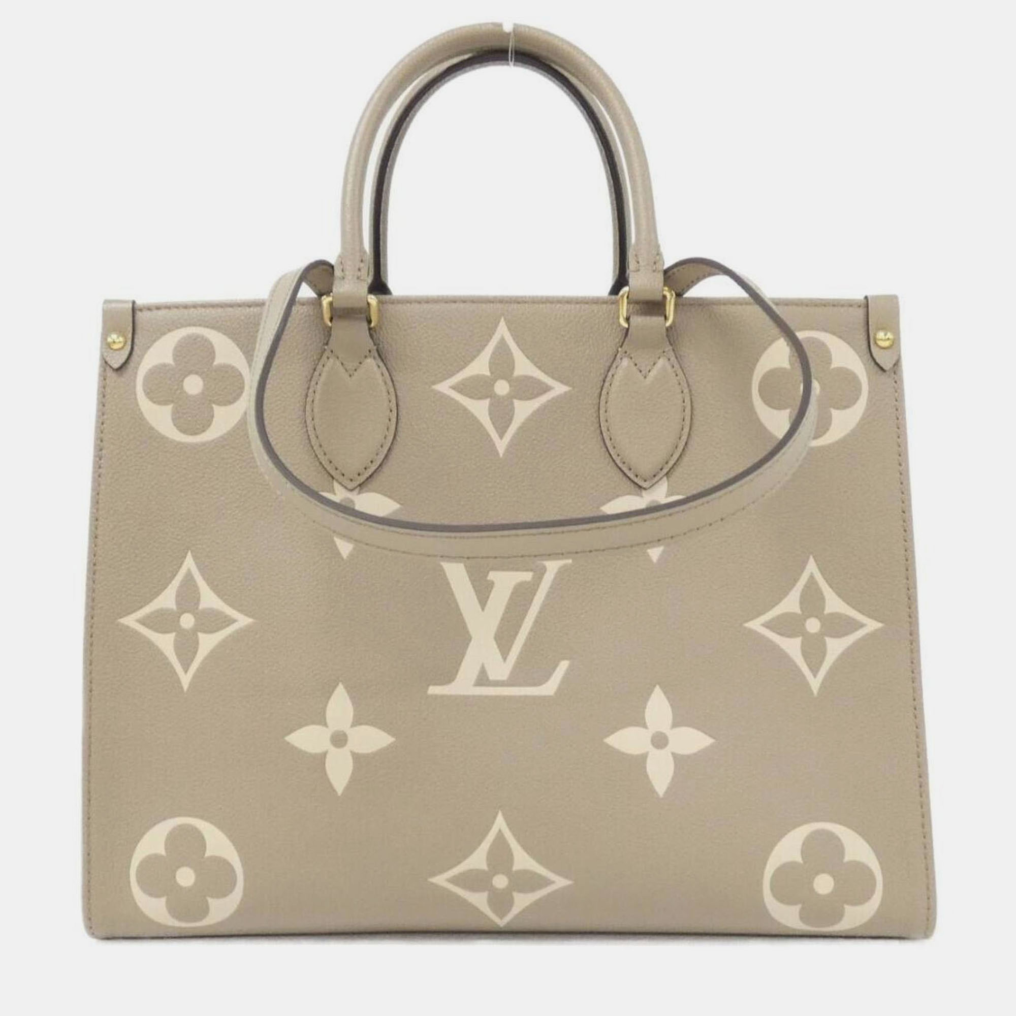 

Louis Vuitton Two-Tone Monogram Empreinte On-The-Go Mm Handbag, Cream