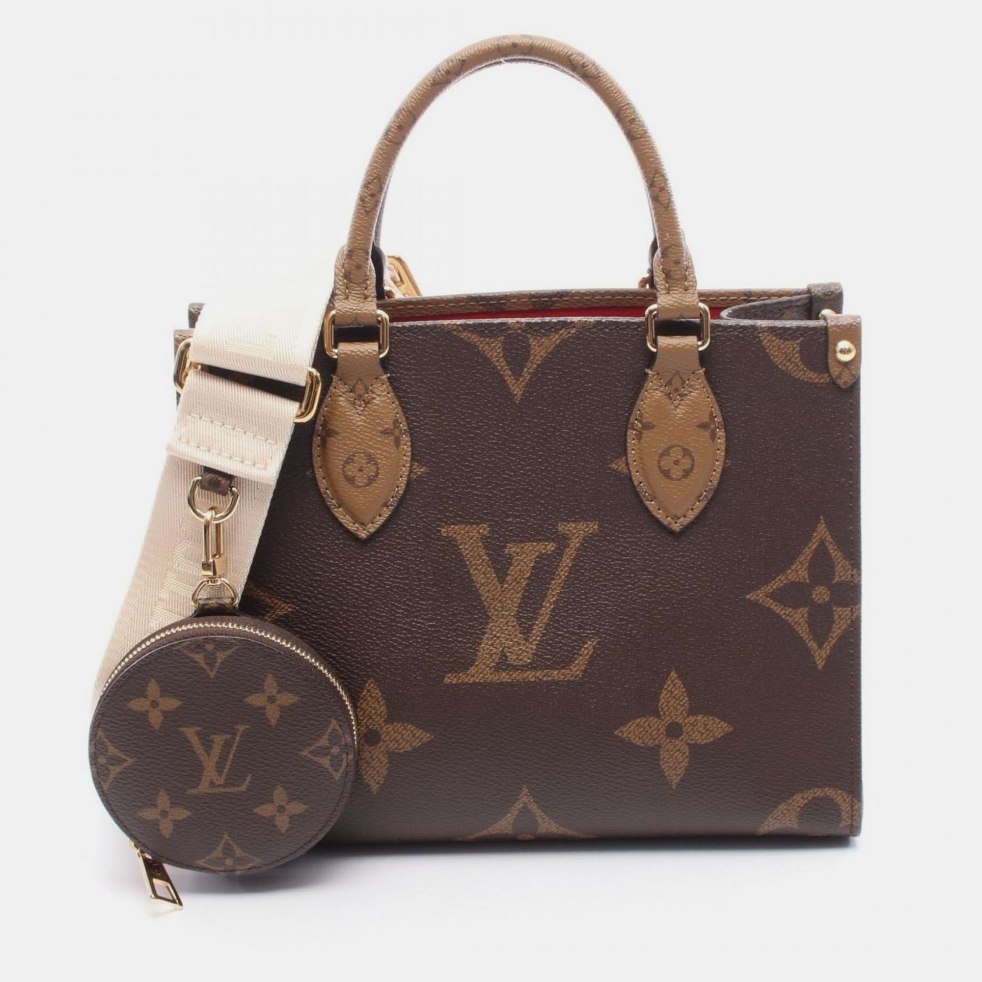 

Louis Vuitton On The Go Pm Handbag In Coated Canvas With Monogram Giant Reverse Brown And Beige