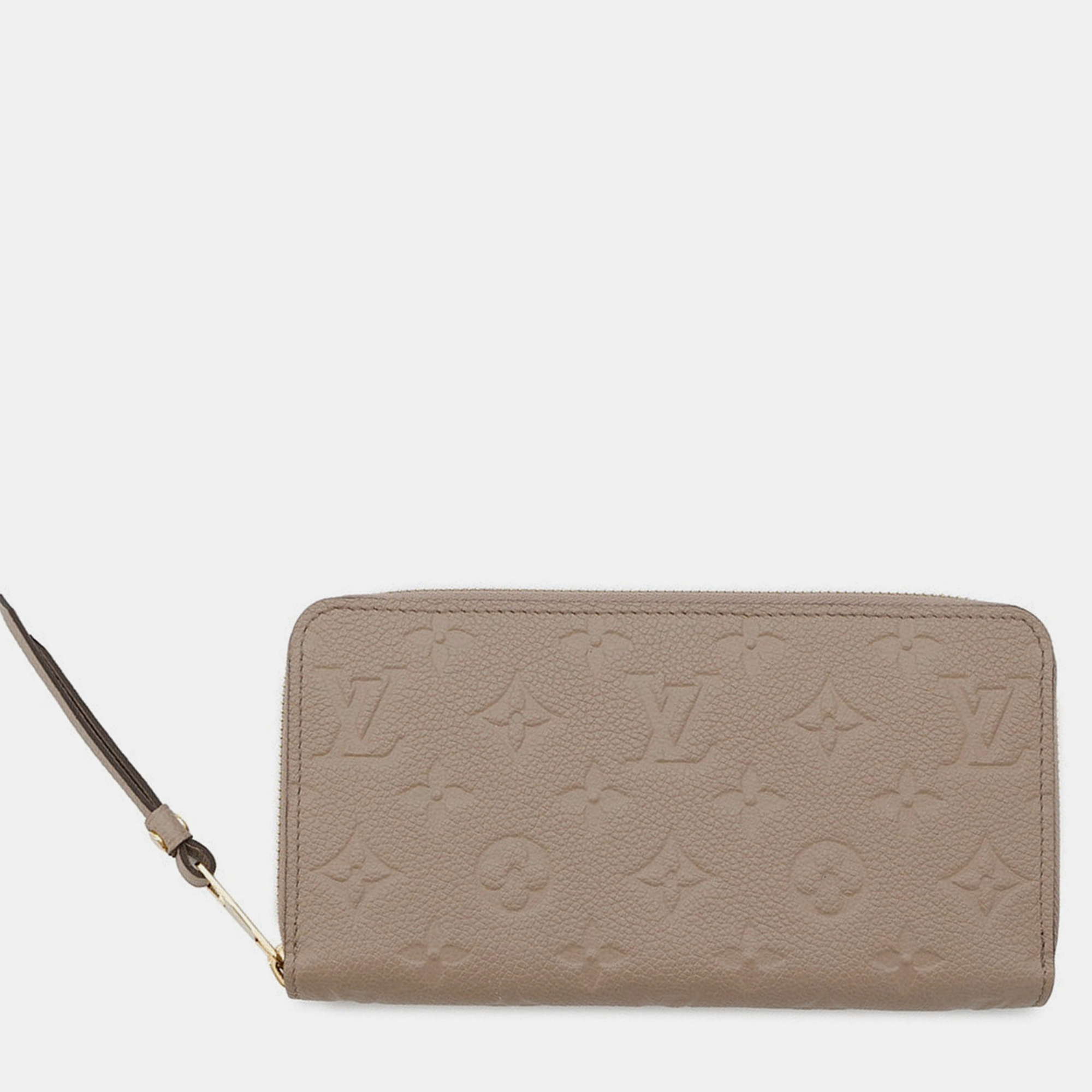 

Louis Vuitton Zippy Wallet Tourterelle Monogram Empreinte Leather, Brown