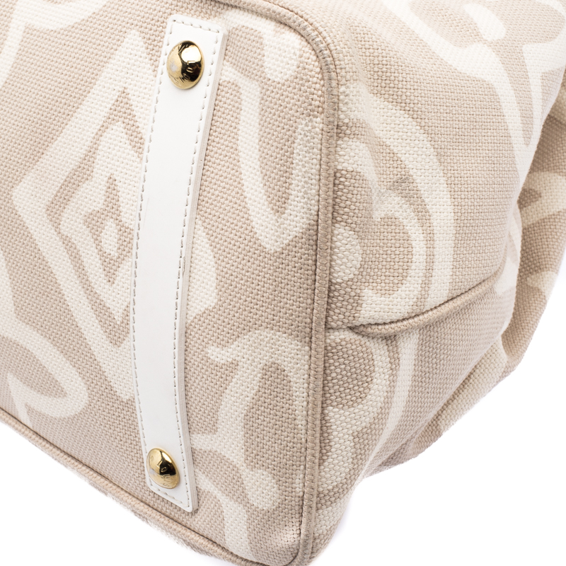 cloth handbag Louis Vuitton Beige in Cloth - 35605861