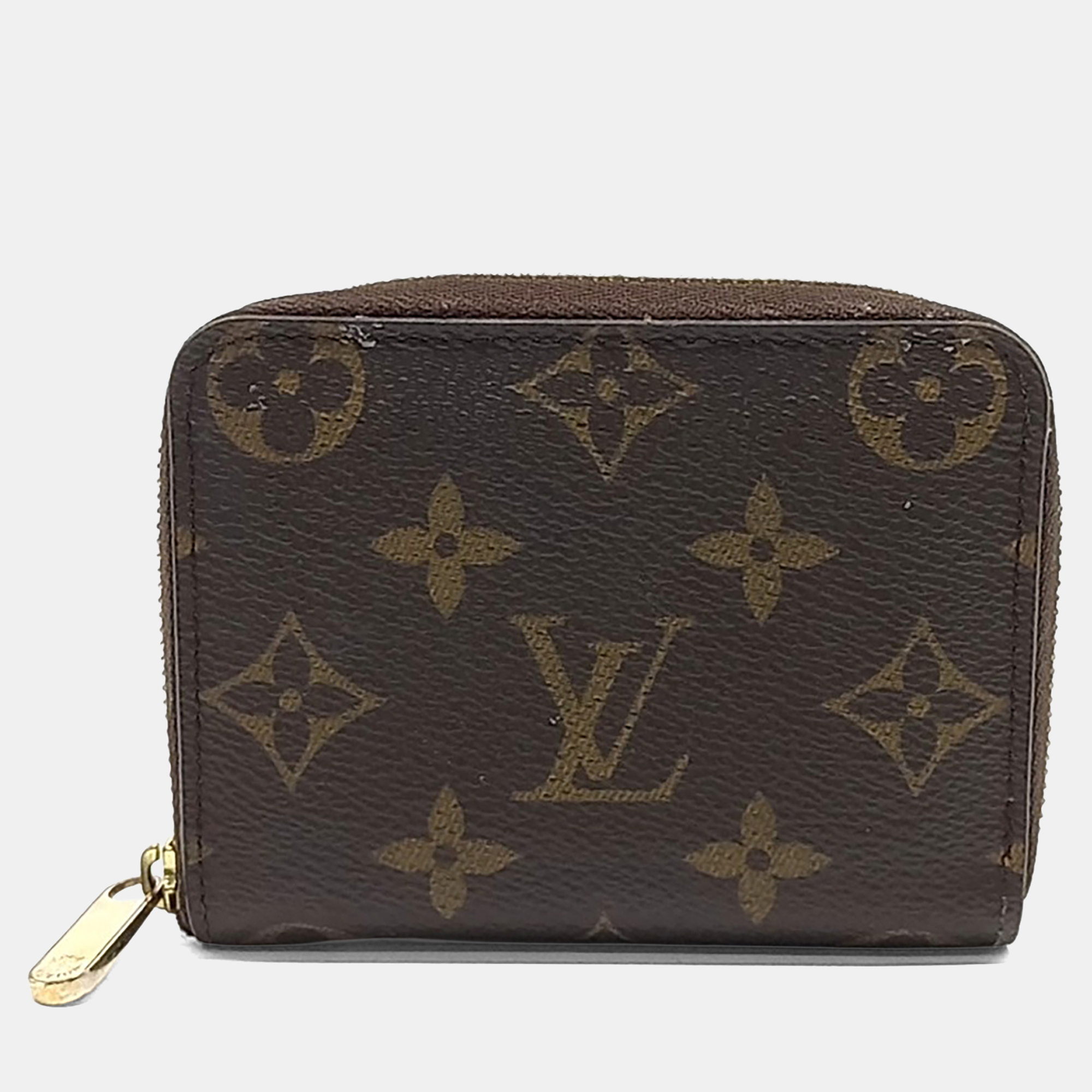 

Louis Vuitton Brown Leather Coin Purse