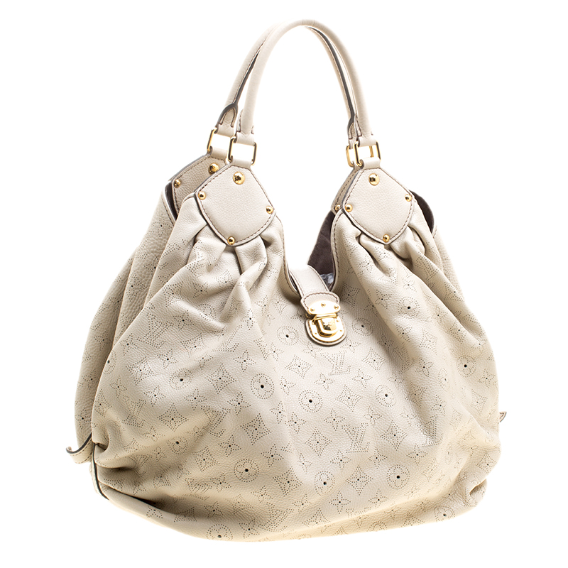 Mahina leather handbag Louis Vuitton Beige in Leather - 26163941