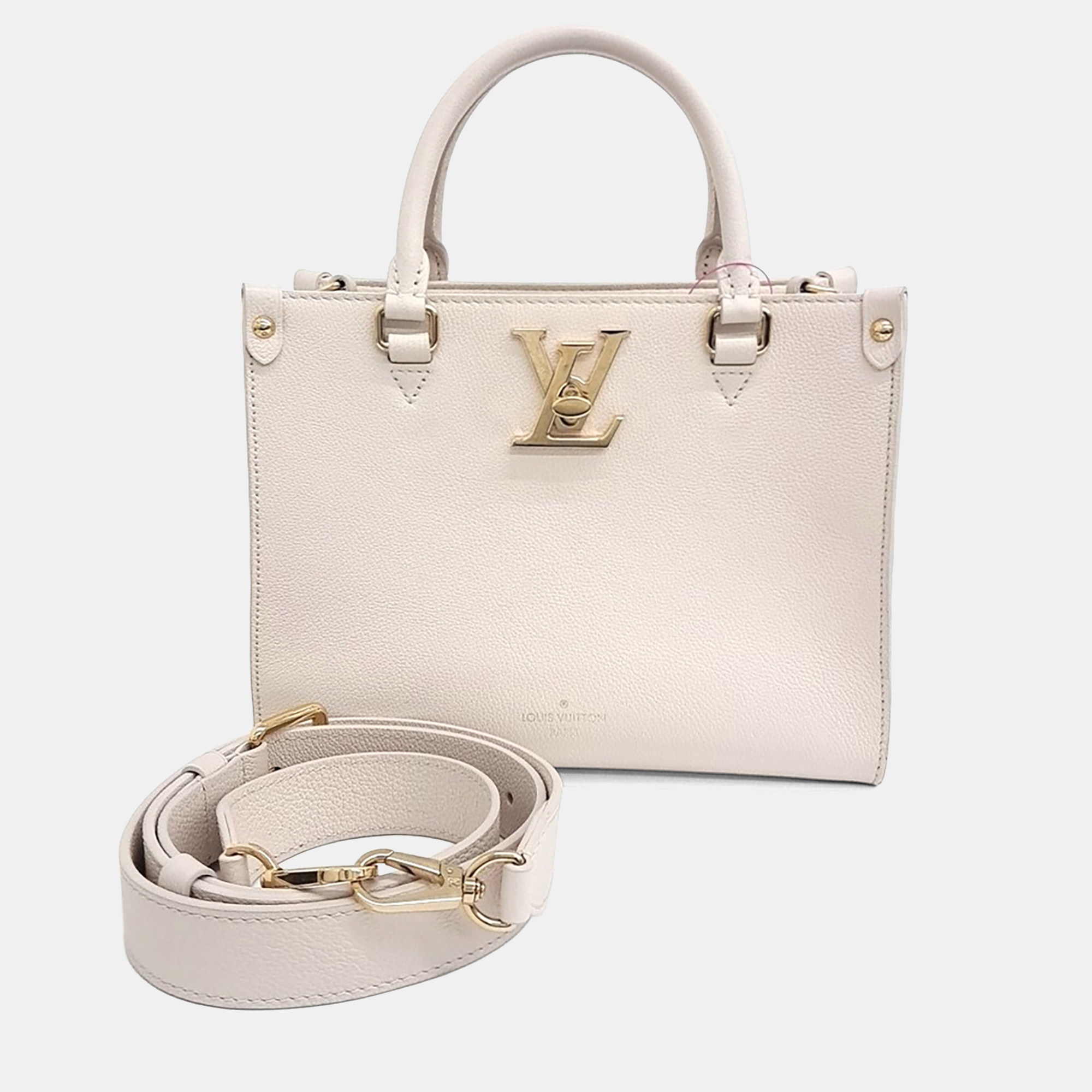 

Louis Vuitton Cream Leather Lock & Go