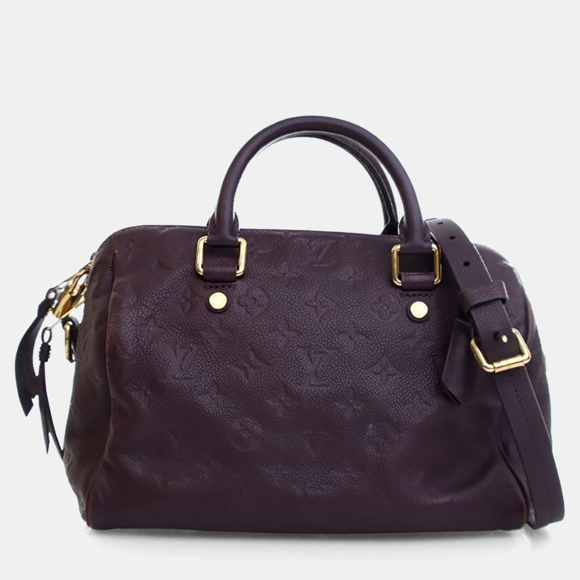 

Louis Vuitton Speedy Bandouliere 25 Monogram Empreinte Leather Top Handle Bag, Black