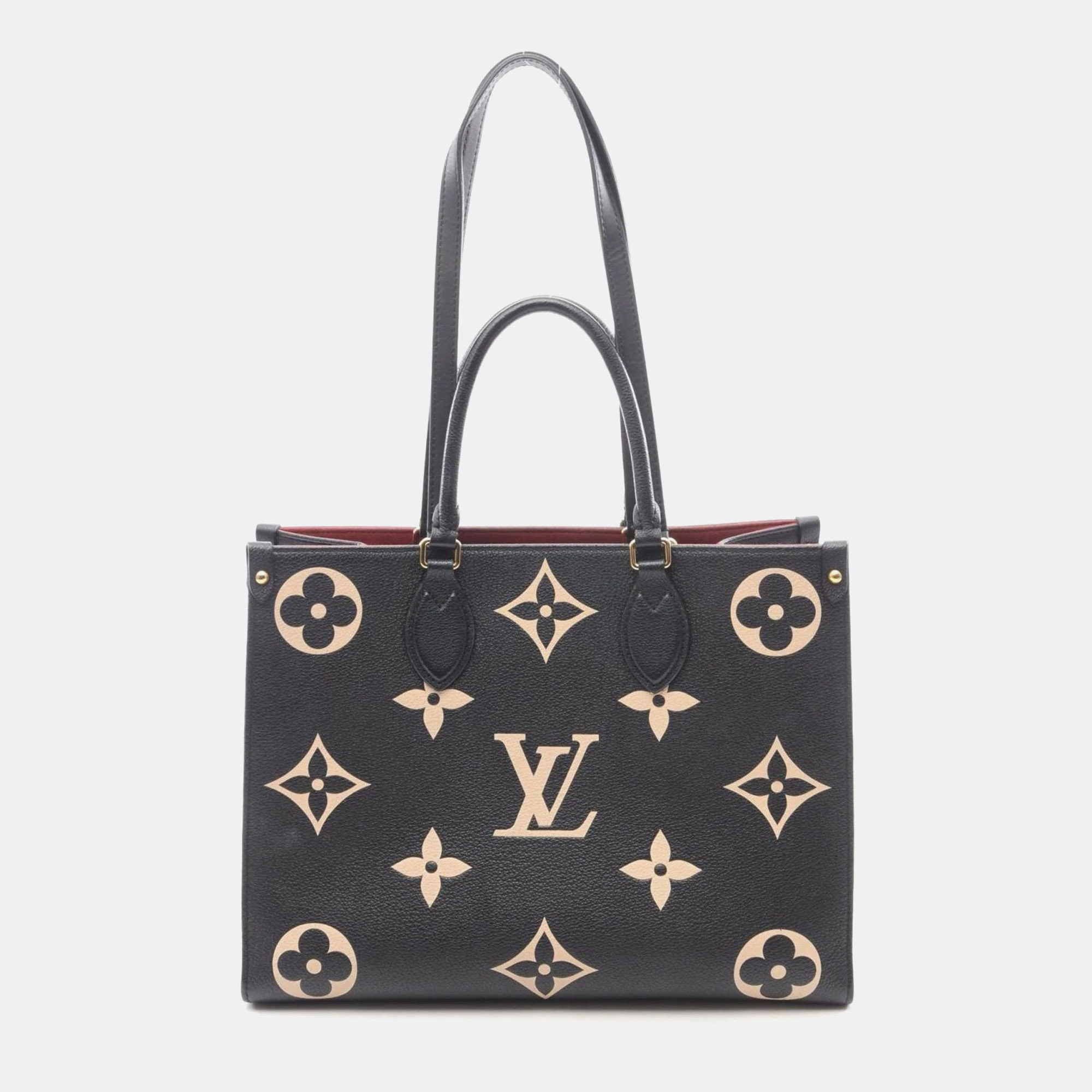 

Louis Vuitton On The Go Mm Two-Tone Tote Bag In Monogram Empreinte Grained Leather Black And Beige