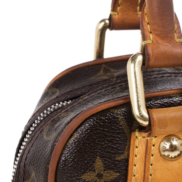 Manhattan cloth handbag Louis Vuitton Brown in Cloth - 36518342